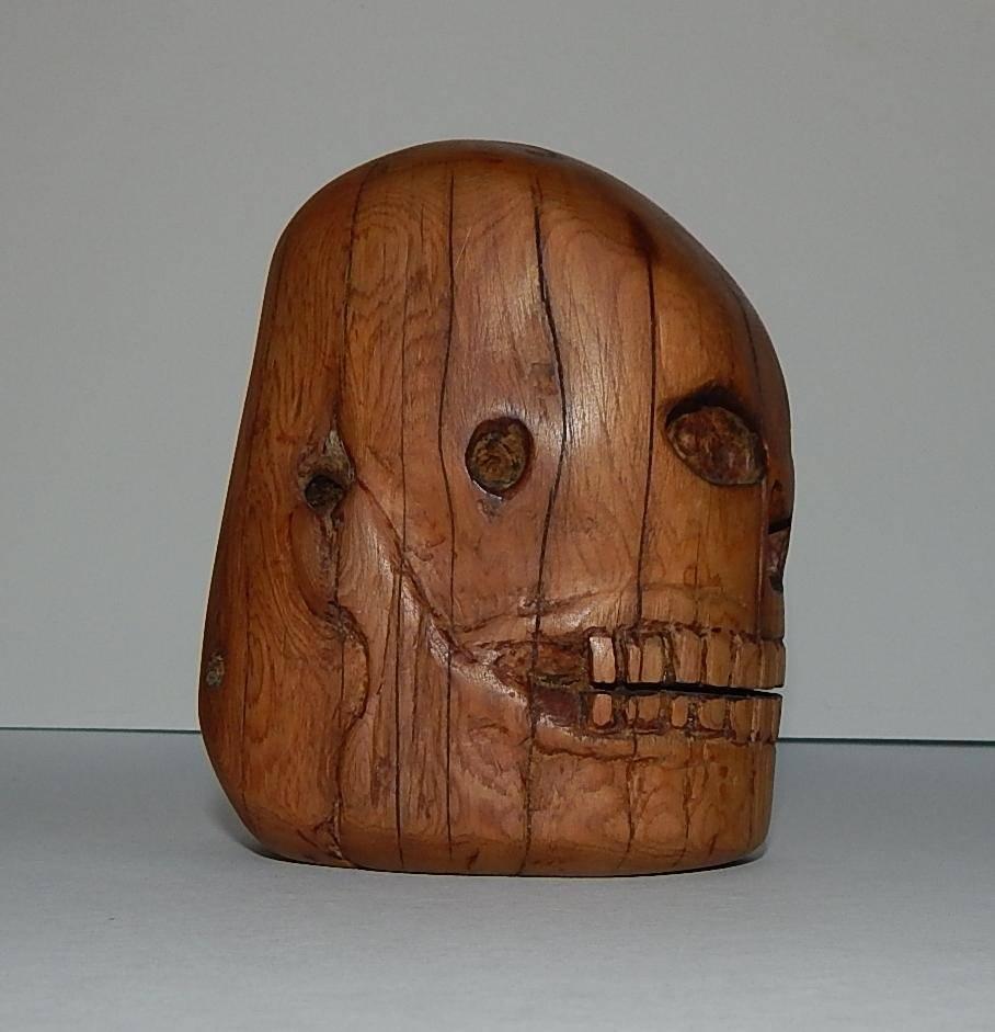 This skeletal figure in Patrocino Barela's Native Juniper wood, may be related 
to the Hispanic “Day of the Dead” traditions.
Hand carved wood sculpture. Signed: PB.
Measures: 4.25