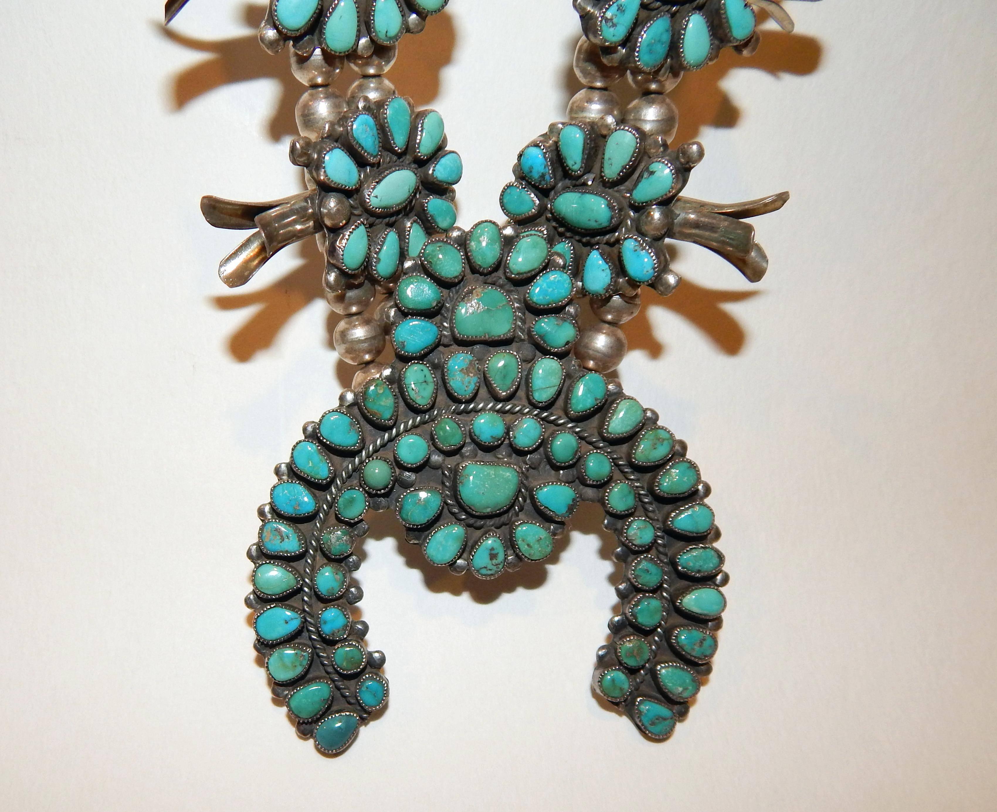 Beautiful Zuni Native American squash blossom necklace.
Sterling and American Turquoise.
29