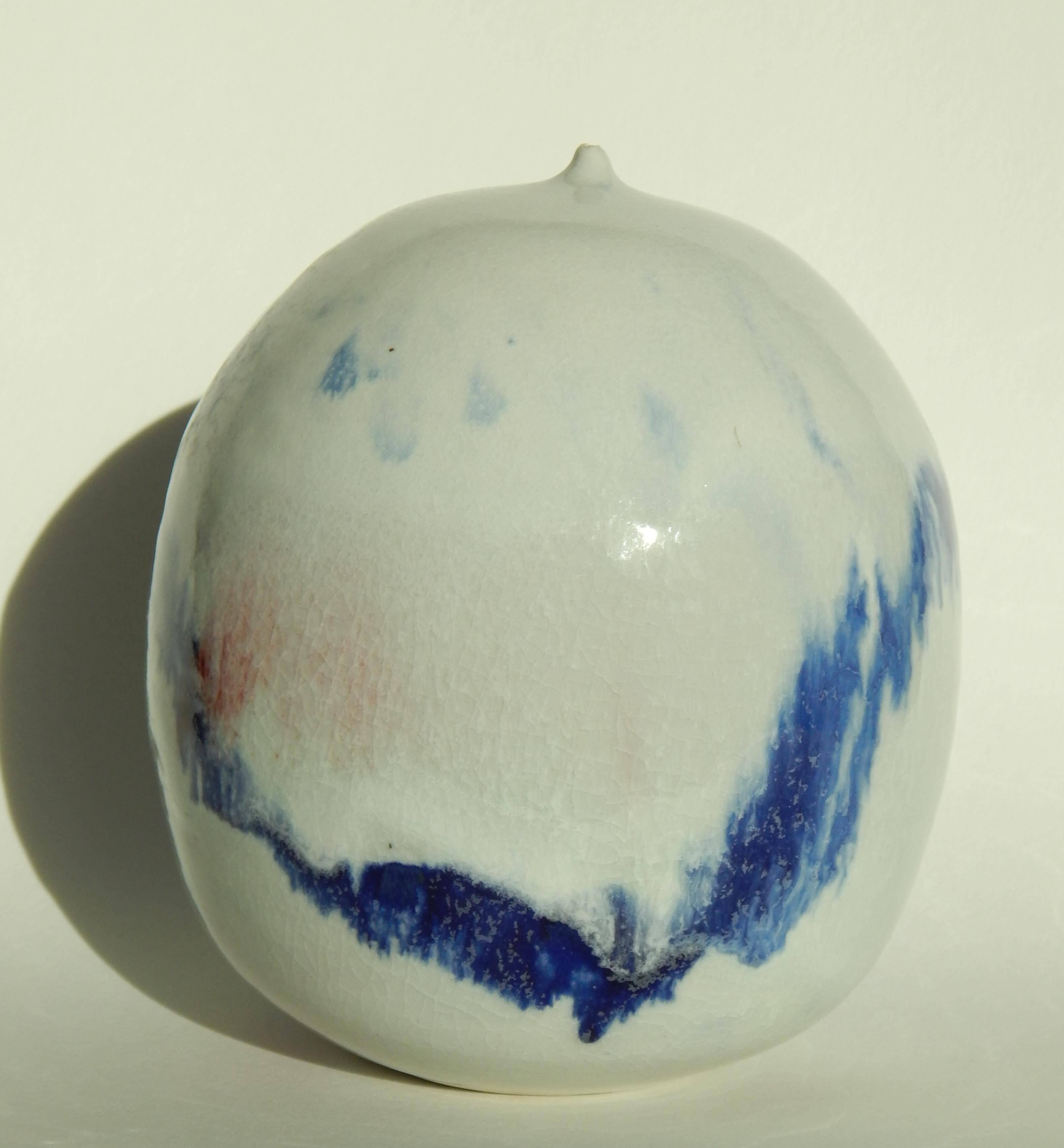 Takeazu Moon Pot, circa 1970s
This beautiful ceramic vase bears an
abstract Expressionist hi gloss glaze.
Marked on the bottom with the artist's monogram: TT
Measures: 7 1/4