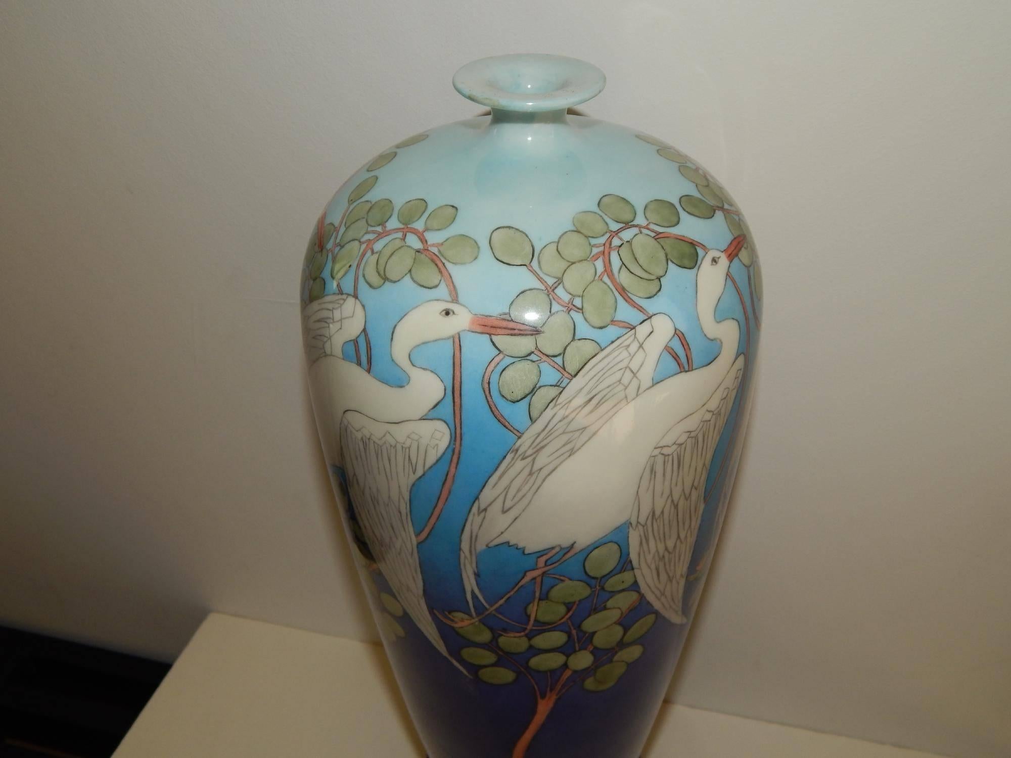 American Belleek, early 20th century.
Art Deco/Art Nouveau/Arts & Crafts.
Gorgeous blue vase decorated with snowy egrets.
Marked on the bottom with the entwined snake Belleek Willets mark.
And signed on the bottom F.M. Mulligan, 1908.
Measures: