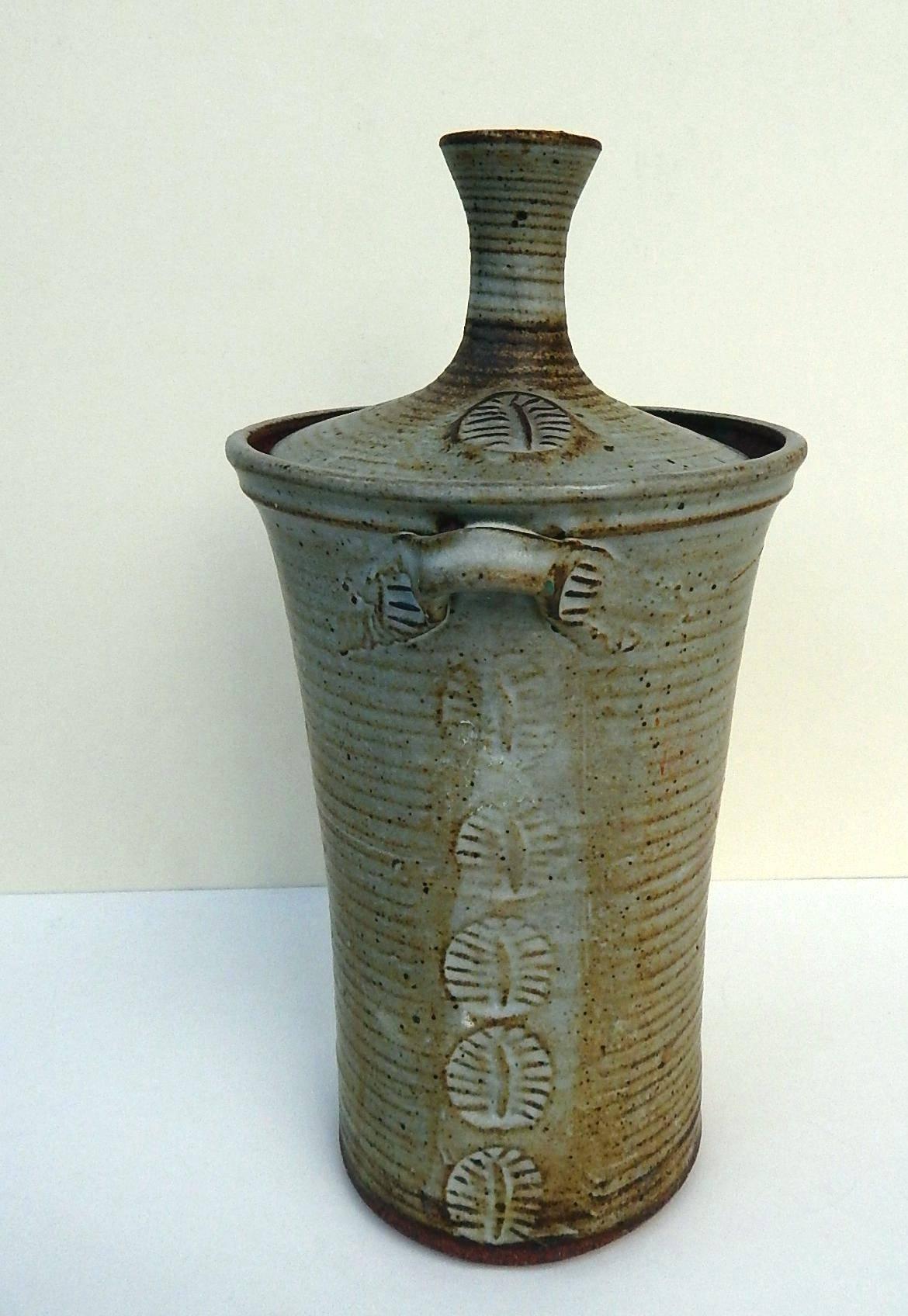 This wonderfully hand thrown lidded vase by Ralph Bacerra.
Measures: 11