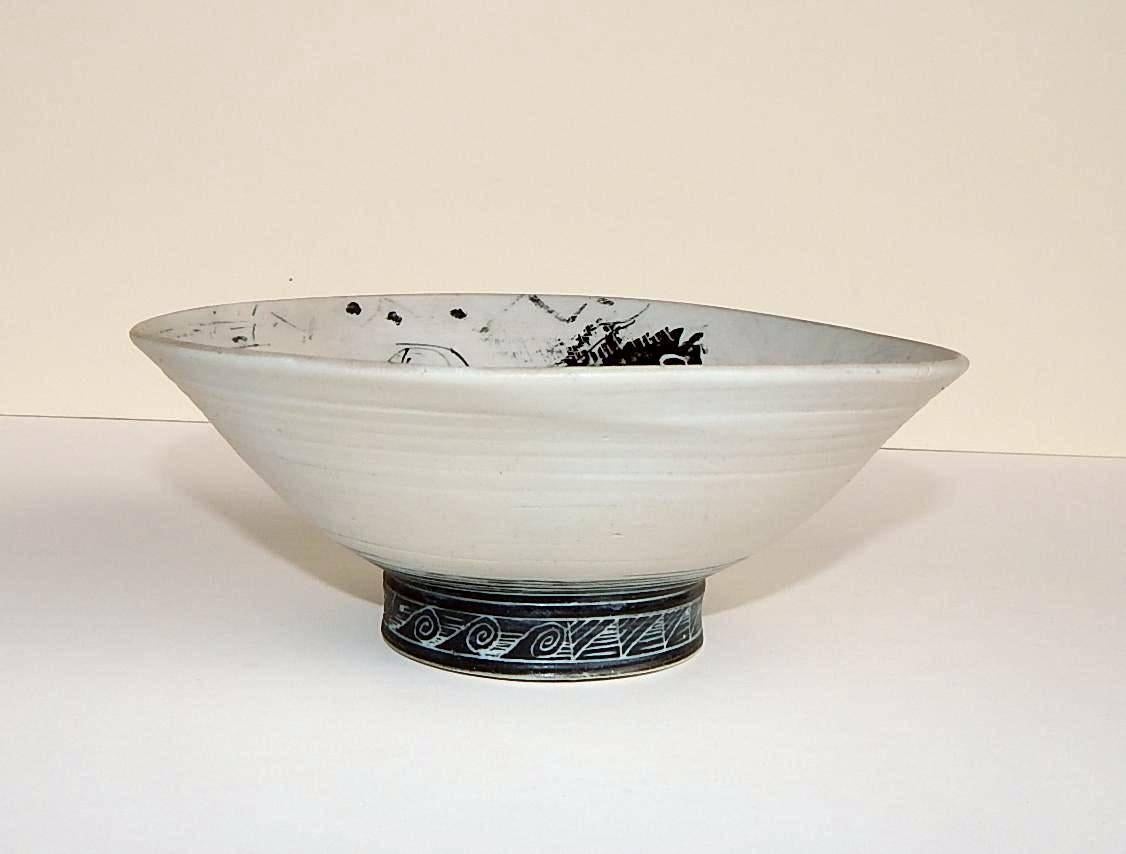 Black and white porcelain bowl with detailed etched design by
Edward Eberle (b. 1944 Contemporary Western PA.)
Title and signature on the bottom: Exotic Place - E.S. Eberle.
Porcelain with terra sigilata,
circa 1980-1990.
Dimensions: 2