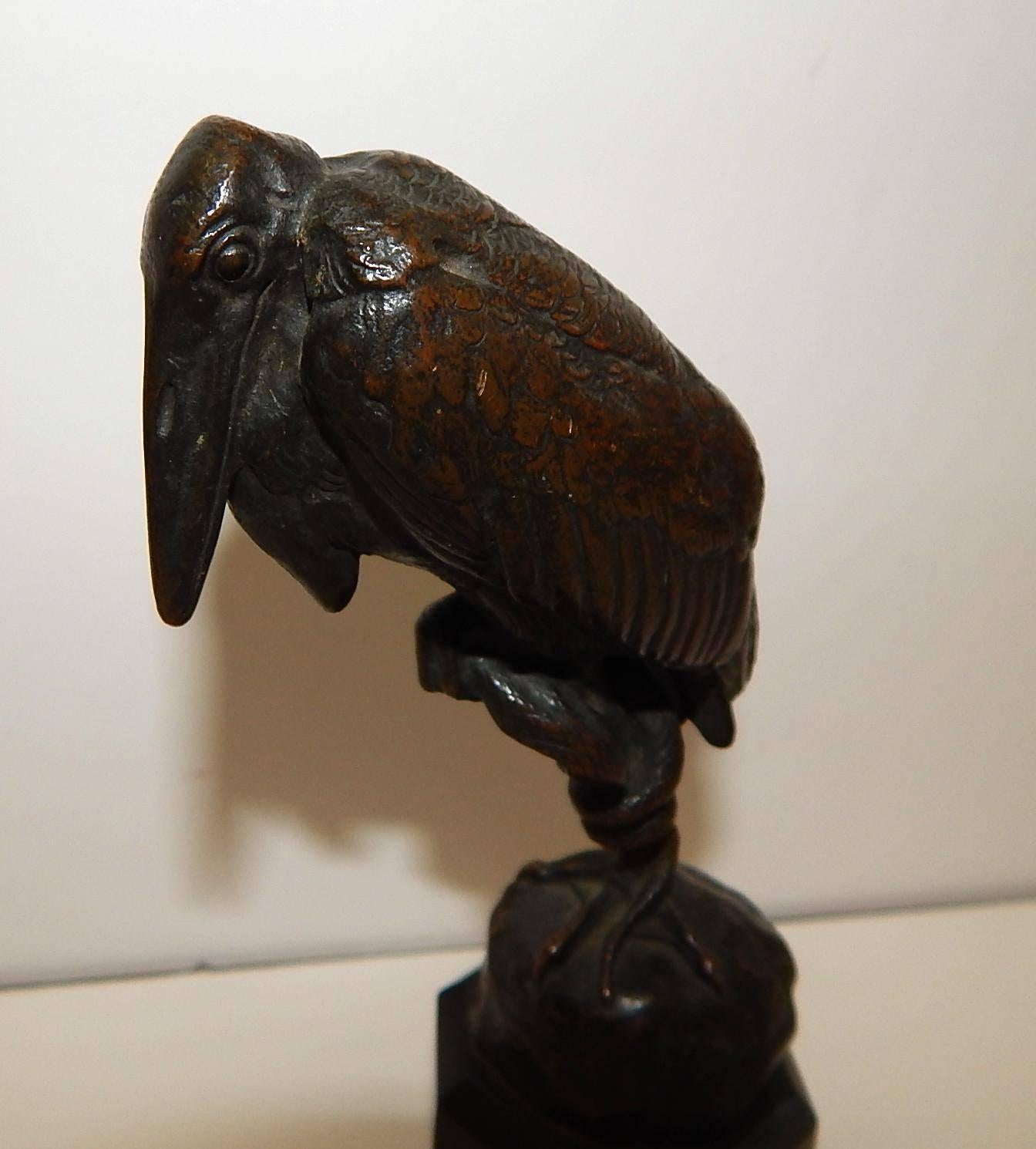 Antoine-Louis Barye (1796-1875.) Bronze maribou stork and snake with rich brown patina, signed “Barye” on the embankment.
Antique edition cast marked F. Barbedienne Fondeur (caster.) On an octagonal black marble plinth. Measures: 6 x 3 ½ x 2 inches
