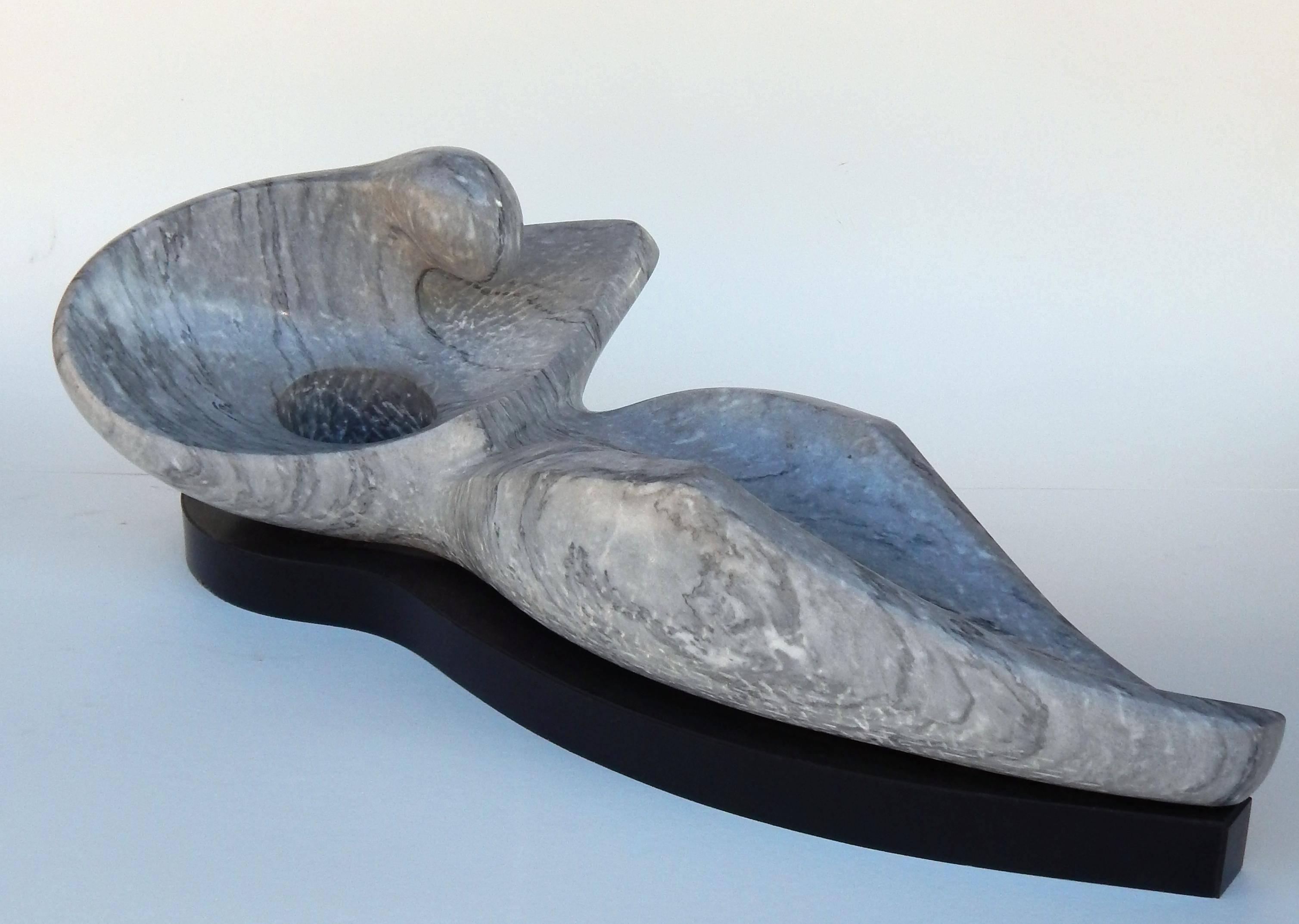 One of a kind marble sculpture by Hungarian born artist.
Miklos Sebek (b. 1941).
Modernist abstract reclining figure.
Comes with 