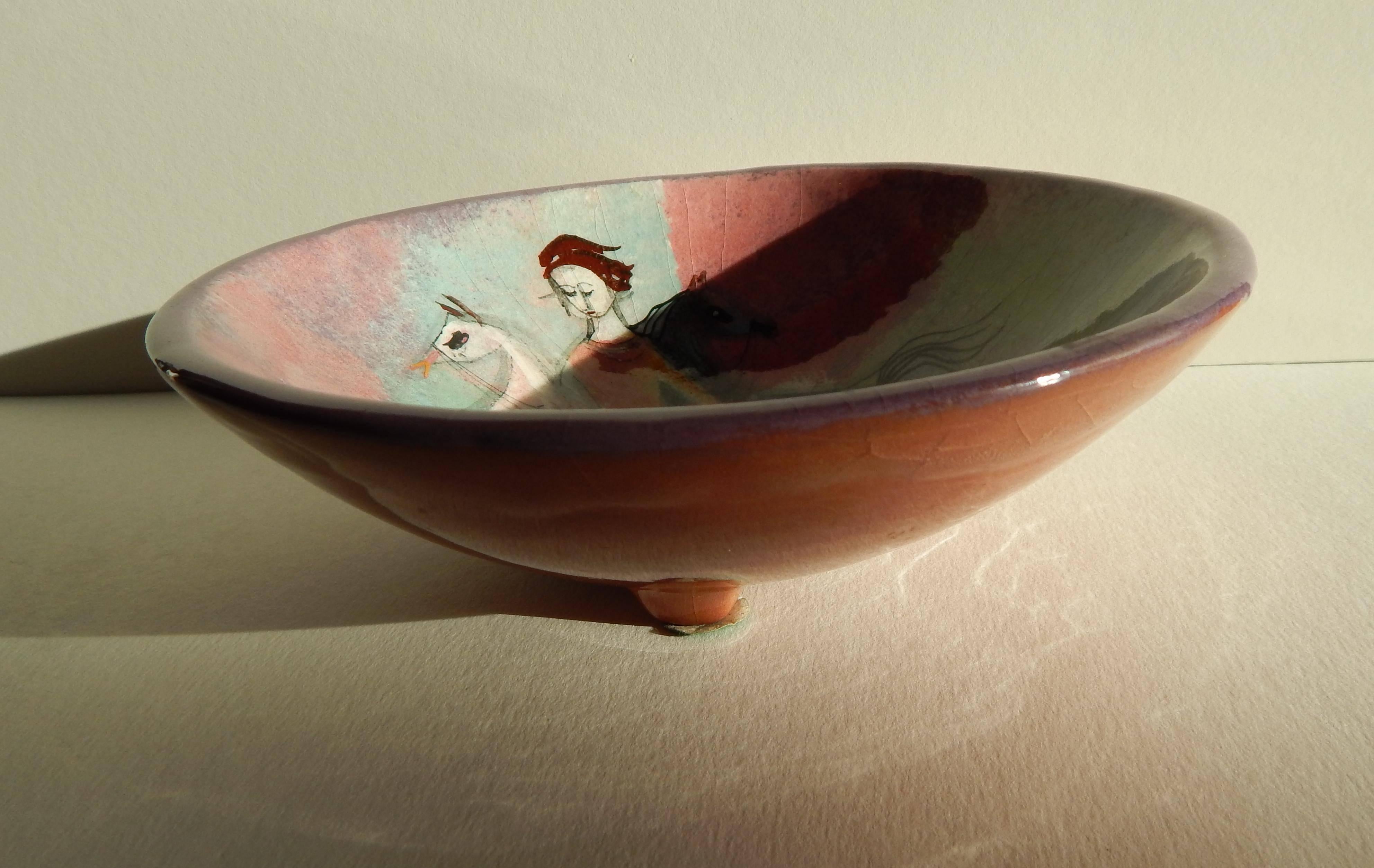 Pillin is known for her whimsical designs and a re-occurring motifs of women, birds, horses and flowers.
Decorated ceramic footed bowl by Polia Pillin (1909-1992).
Signed on the bottom: Pillin.
Perfect condition, no chips, cracks or