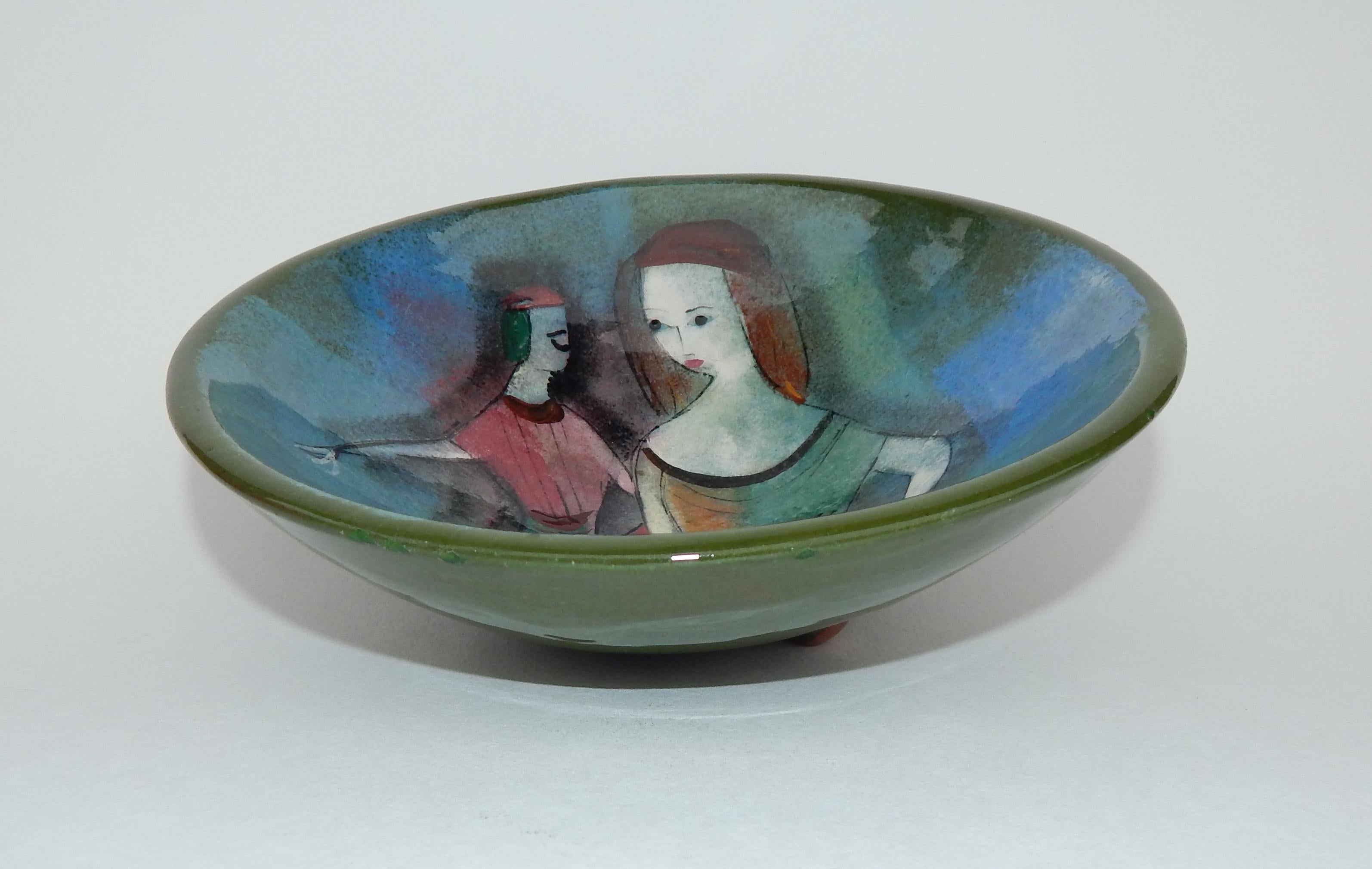 Pillin is known for her whimsical designs and a re-occurring motifs of women, birds, horses and flowers.
Decorated ceramic footed bowl by Polia Pillin (1909-1992).
Signed on the bottom: Pillin.
Perfect condition, no chips, cracks or