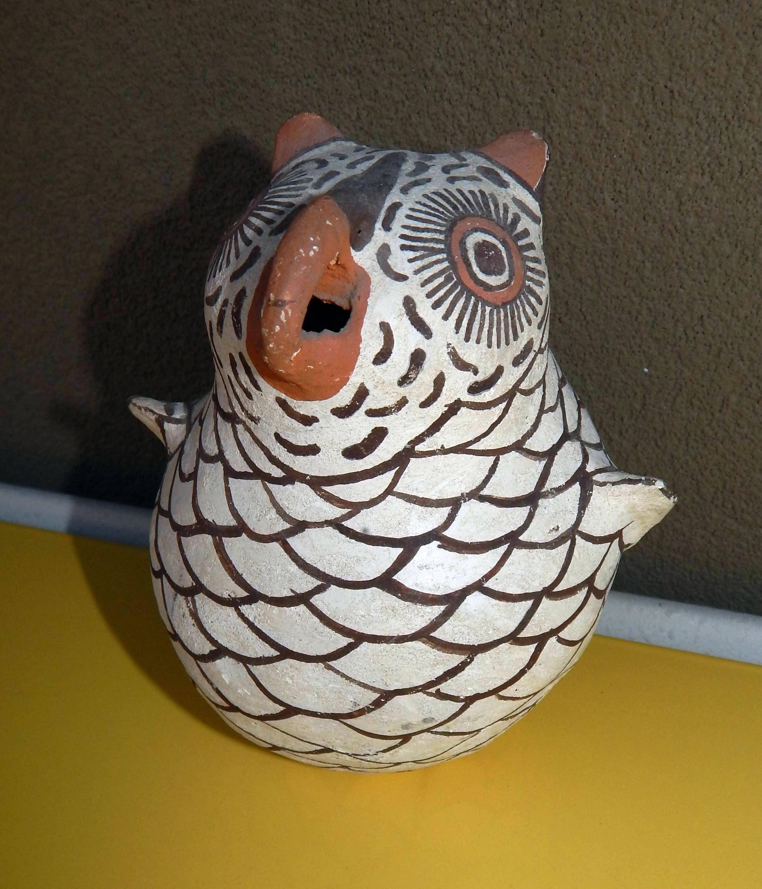 Zuni Pottery owl figurine by Nellie Bica. 
Signed on the bottom with initials N.B. for Nellie Bica.
Measures: 5 ½