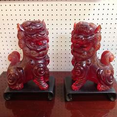 Pair of Mid-20th Century Hand-Carved Chinese Reconstituted Amber Foo Lions