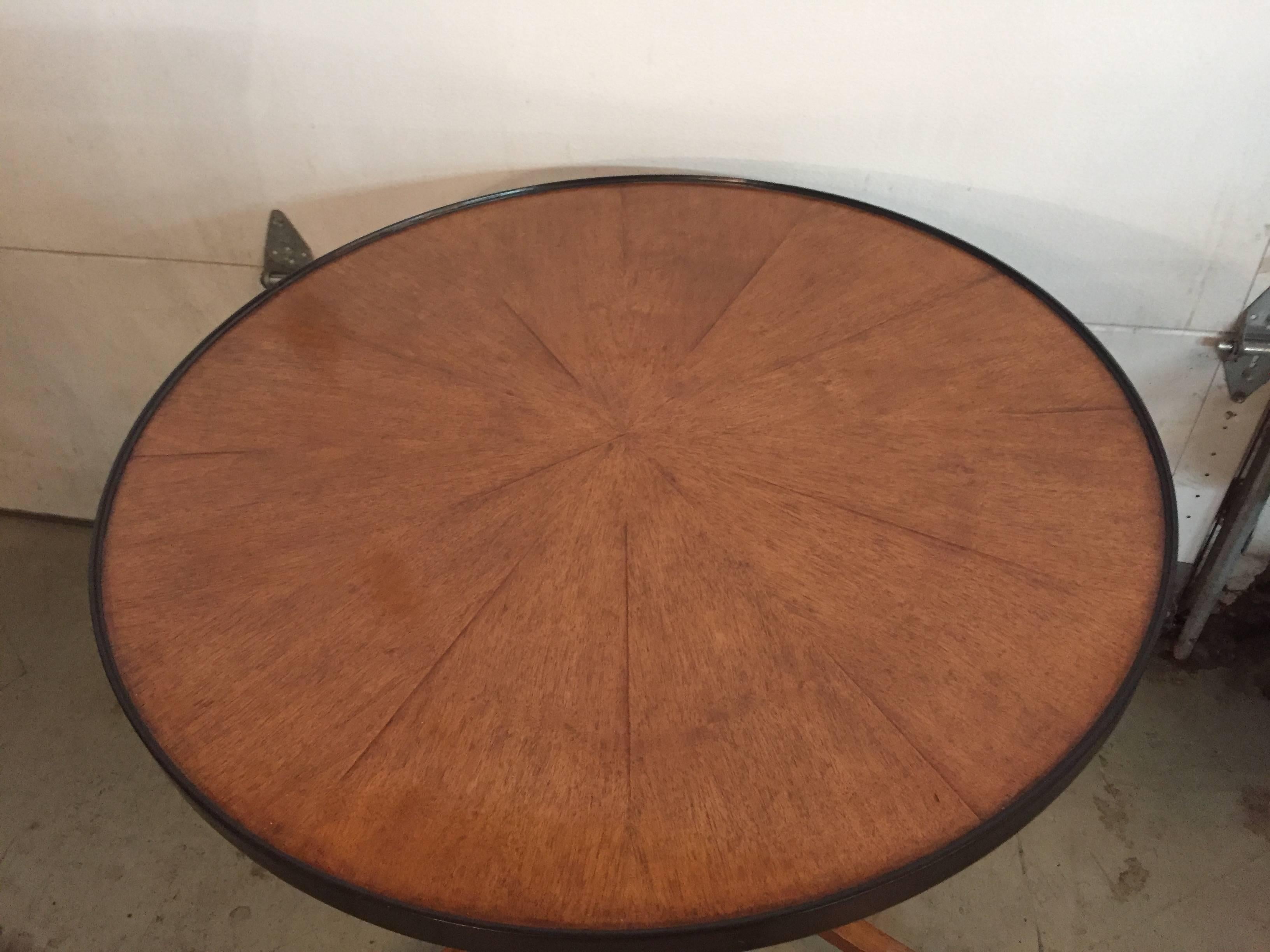 This Classic table by Dessin Fournier, a Parisian design Firm now located in the US that brings the design Community beautiful products unrivaled in quality with a level of service unmatched in today's marketplace is absolutely exquisite and in