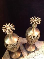 Pair of Brass Ornamental Sculptures on Steel Bases with Brass Feet