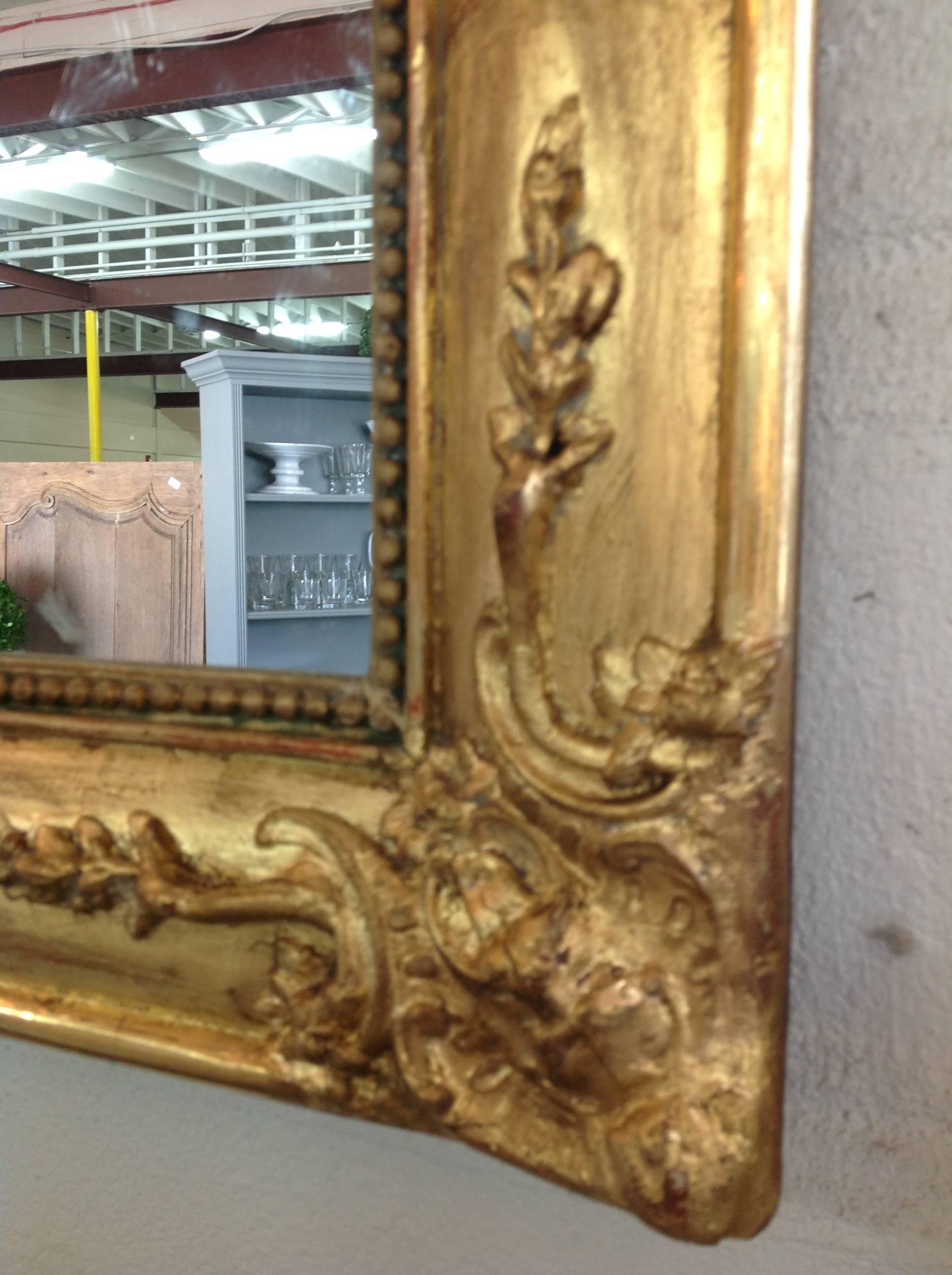 French Louis Phillipe Mirror with Beading, Lattice, Flowers and Ornate Corners For Sale