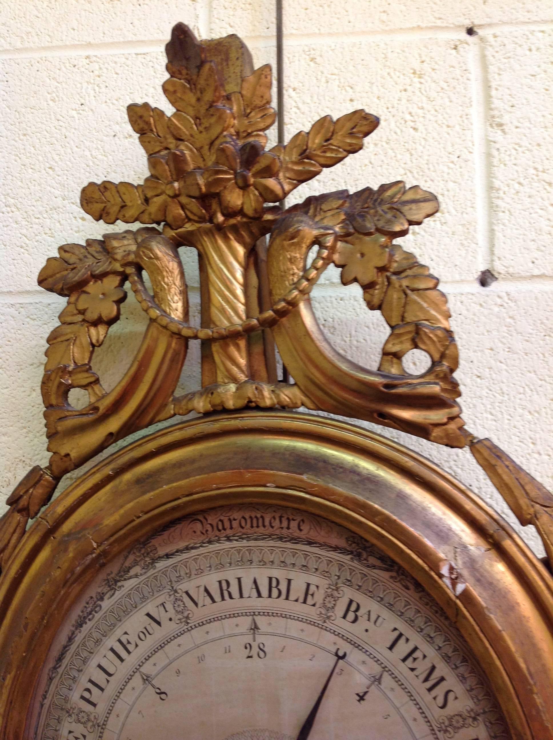 This exquisite Louis XVI period giltwood Barometer with birds and acanthus leaves is perfect for those who have a collection. There are minor repairs that have been done.