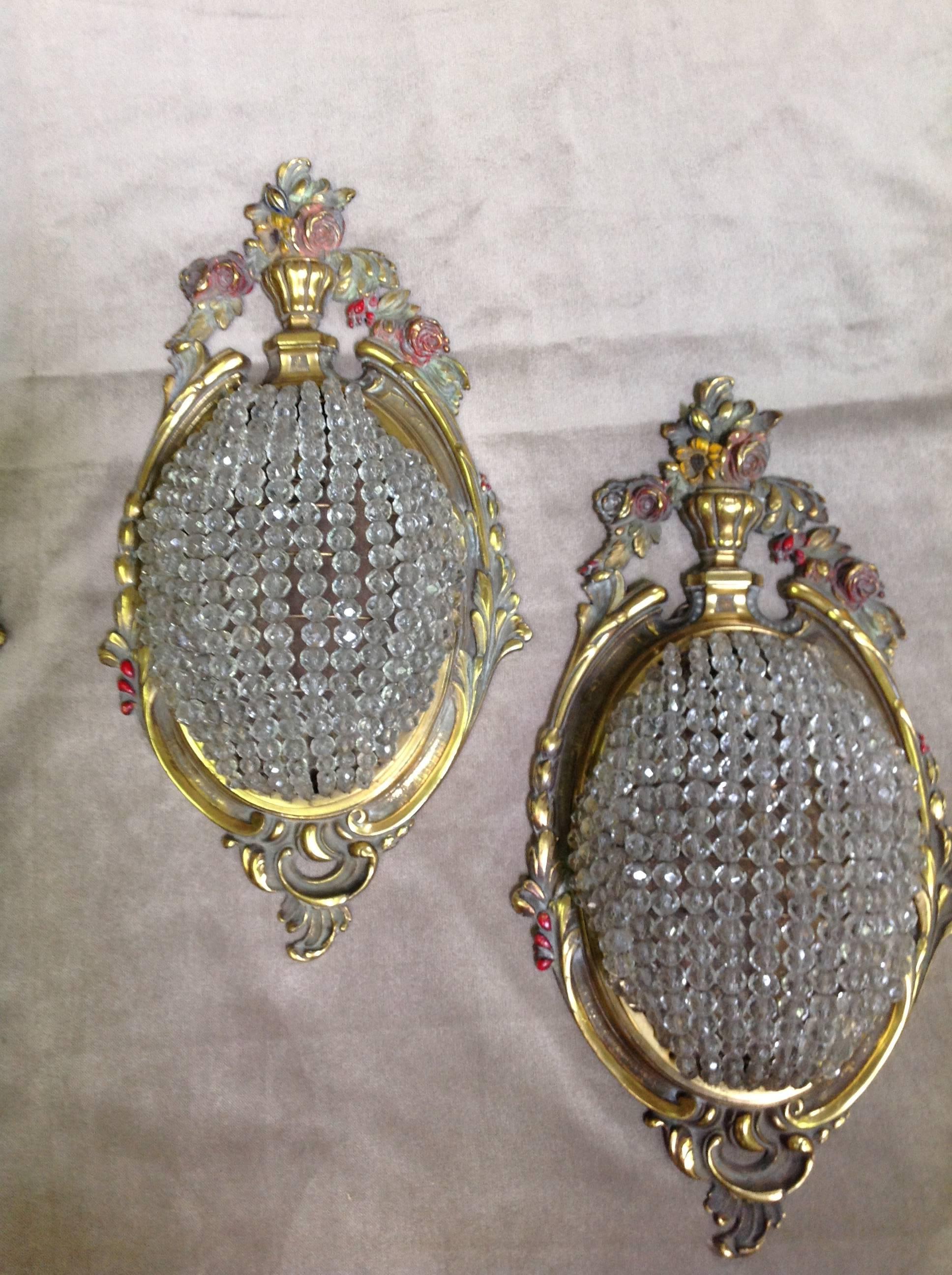 These four French sconces from the 1920s are exquisite. Recommend professional rewiring.