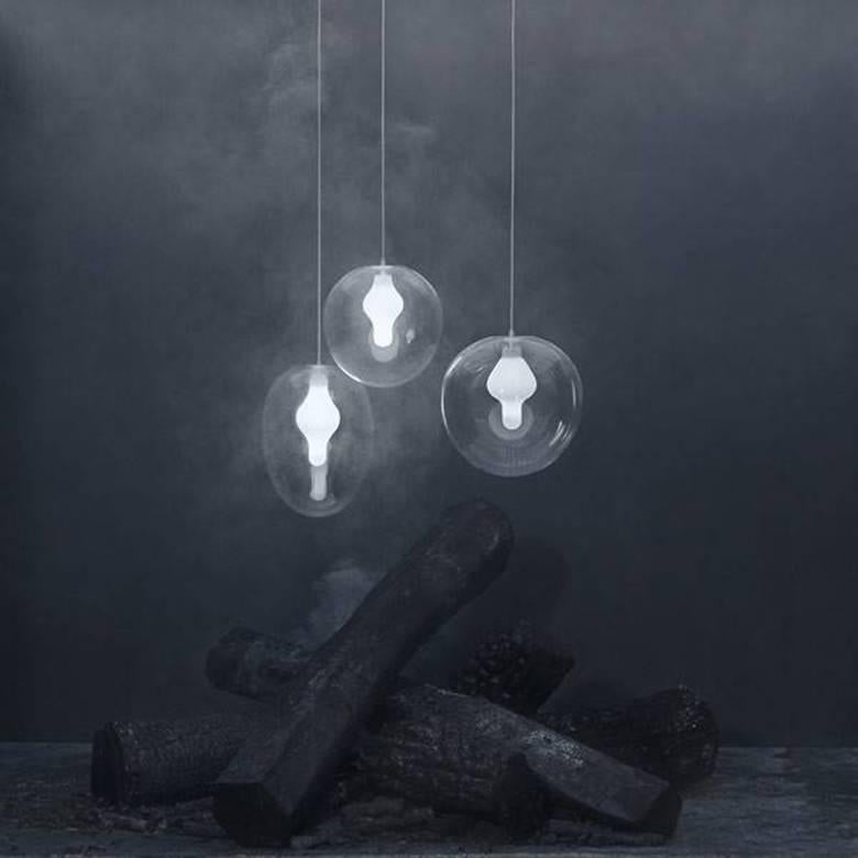 Artist: Eva Eisler.

Manufacturer: Preciosa.

The simple and graceful forms of the Souls light pendants are created from pure and frosted mouth-blown crystal, perfected with innovative technology evoking purity and mystery, harmony and gentleness.