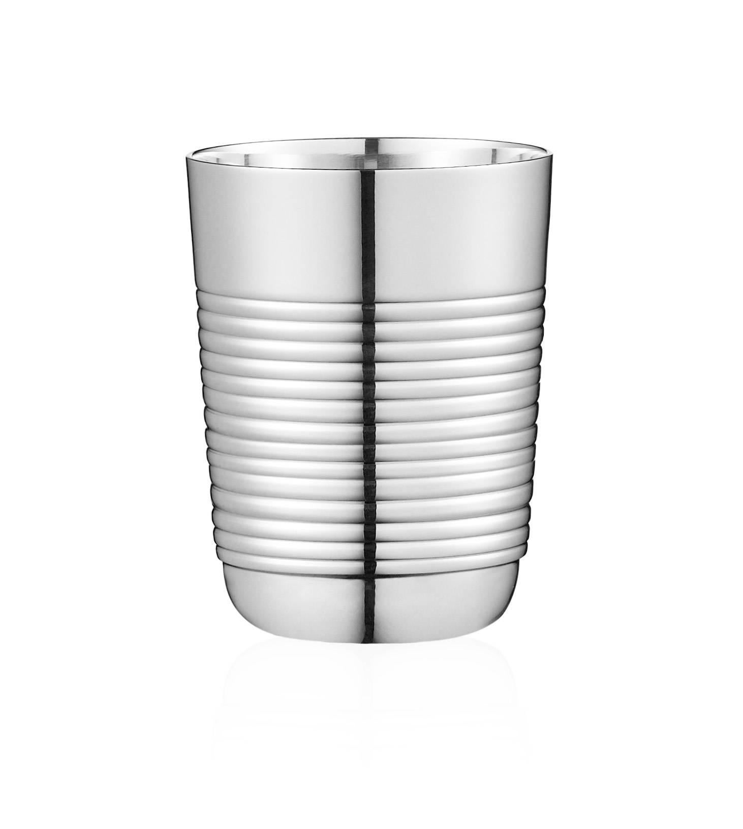Designer.
Jean Puiforcat, 1935.
 
Description:
The understated elegance of Puiforcat's Filleted Shaker Set is emphasized by the painstaking silver work required to create this perfectly sleek and oblong sterling silver shape. The shaker is