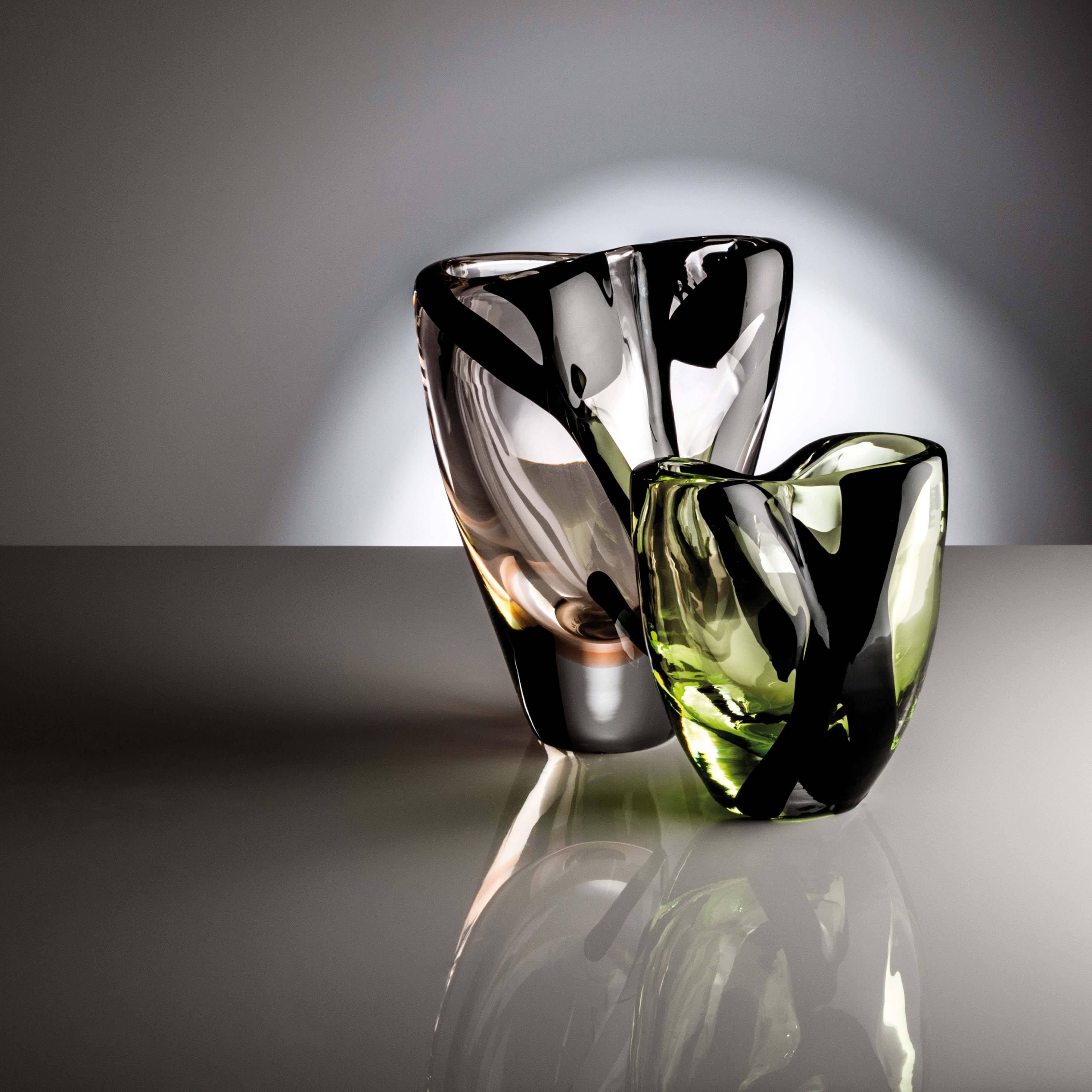 The Otto vase comes in two sizes and two different color-ways; the present example is the medium size with green and black decoration. 

The vases from Peter Marino’s first collection of art glass evolved from his interest in the power of light