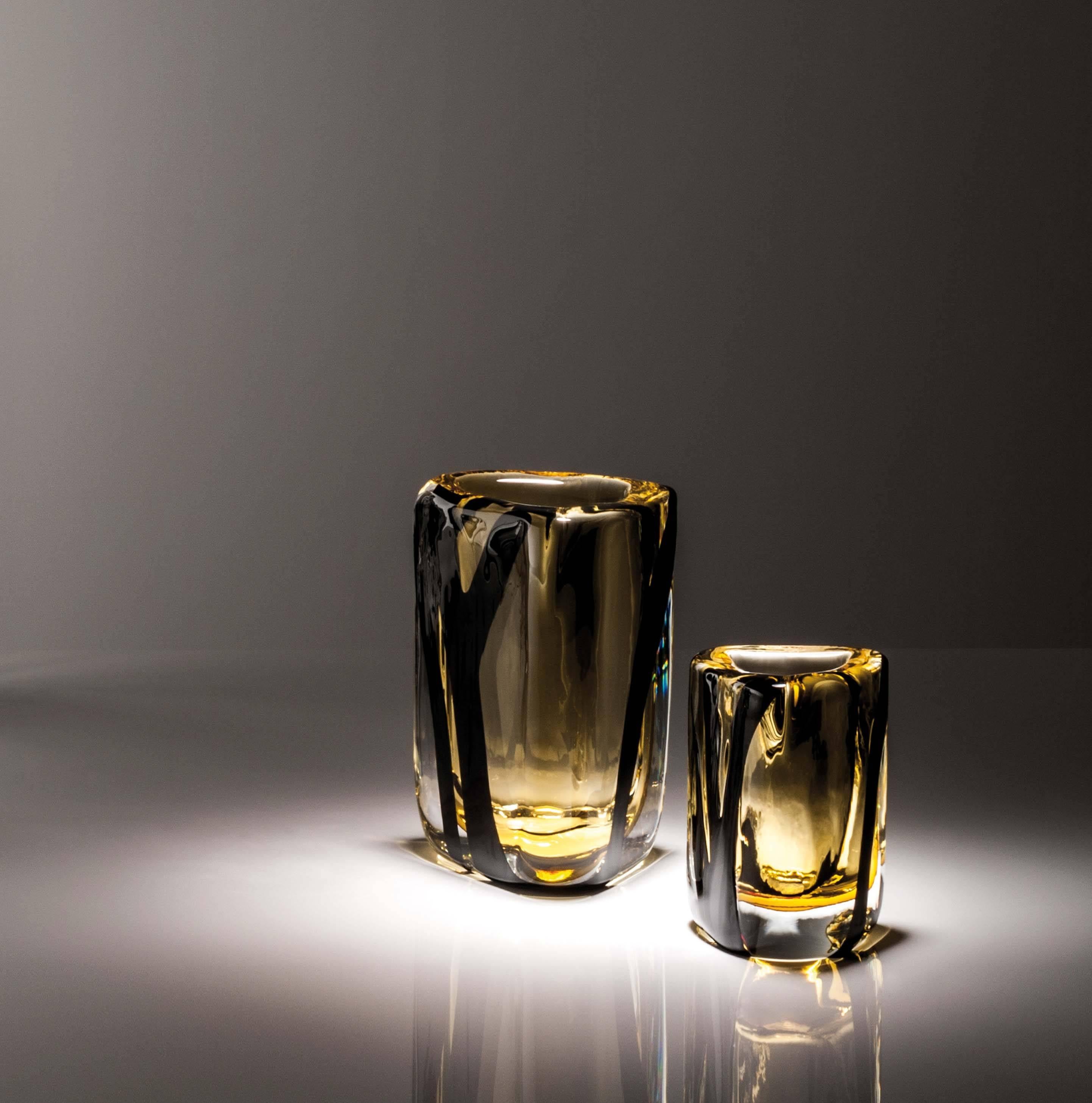 The Triangolo vase comes in three sizes and two different color-ways; the present example is the extra-small size with tea and black decoration. 

The vases from Peter Marino’s first collection of art glass evolved from his interest in the power