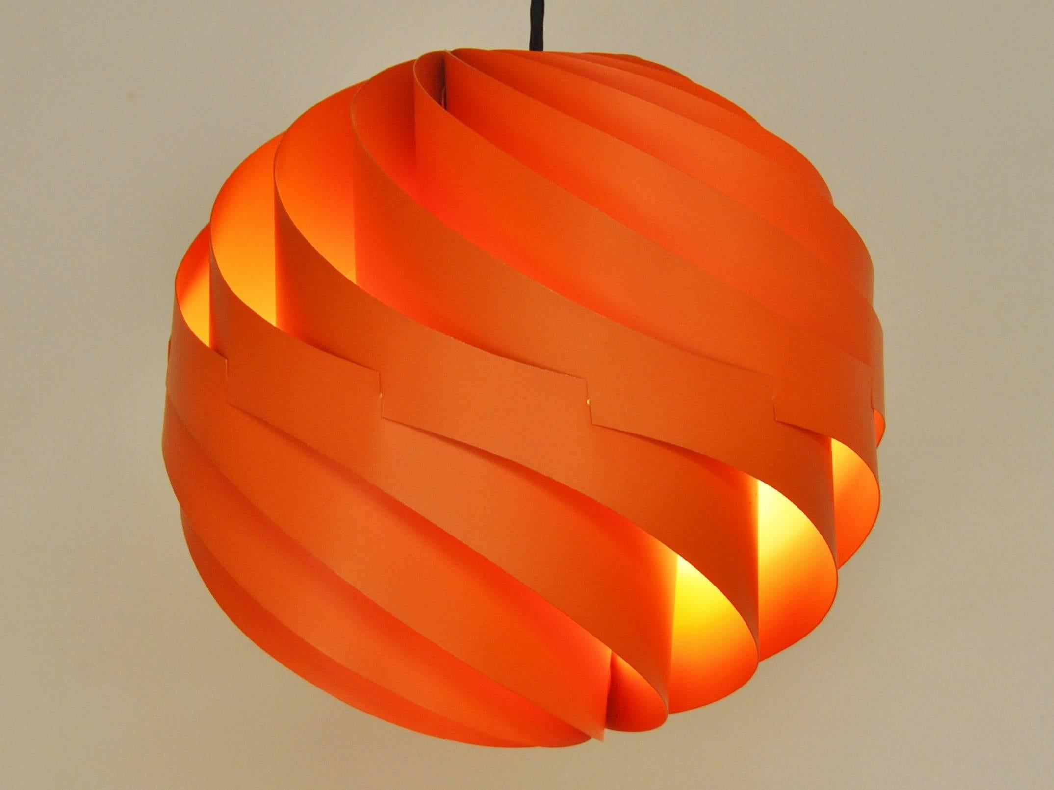 The right name for this lamp, 'Turbo.' It looks like it keeps on turning, faster and faster.... designed by Louis Weisdorf in the 1960s. This pendant is fully original and is in a superb condition. Some minor signs of age, but overall it looks as