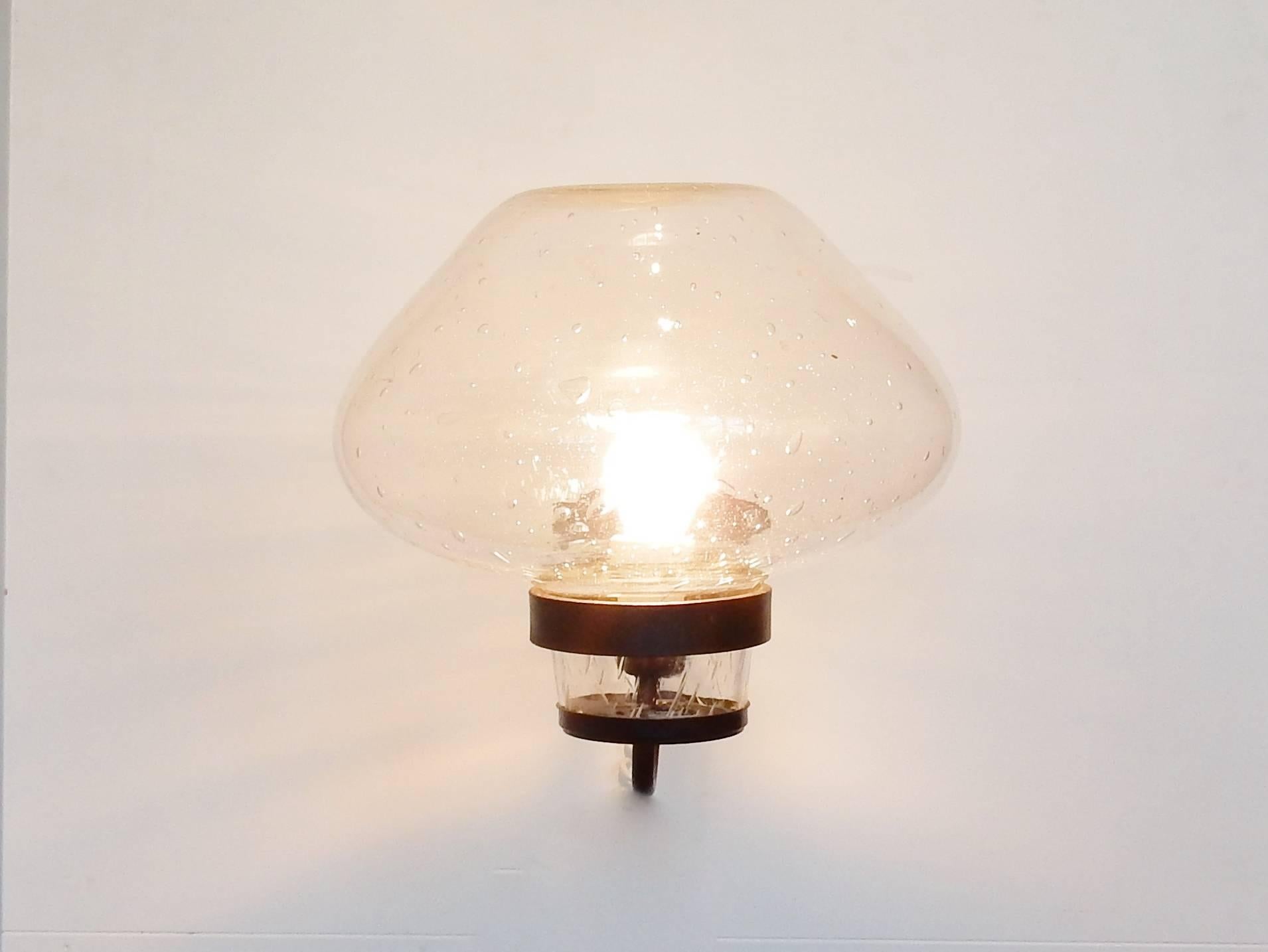 This large size wall lamp is a design by Gunnar Asplund and manufactured by the Swedish company ASEA. A beautiful item in a very good condition. Can be used outside as well as inside. This large size is a very rare size to find of this