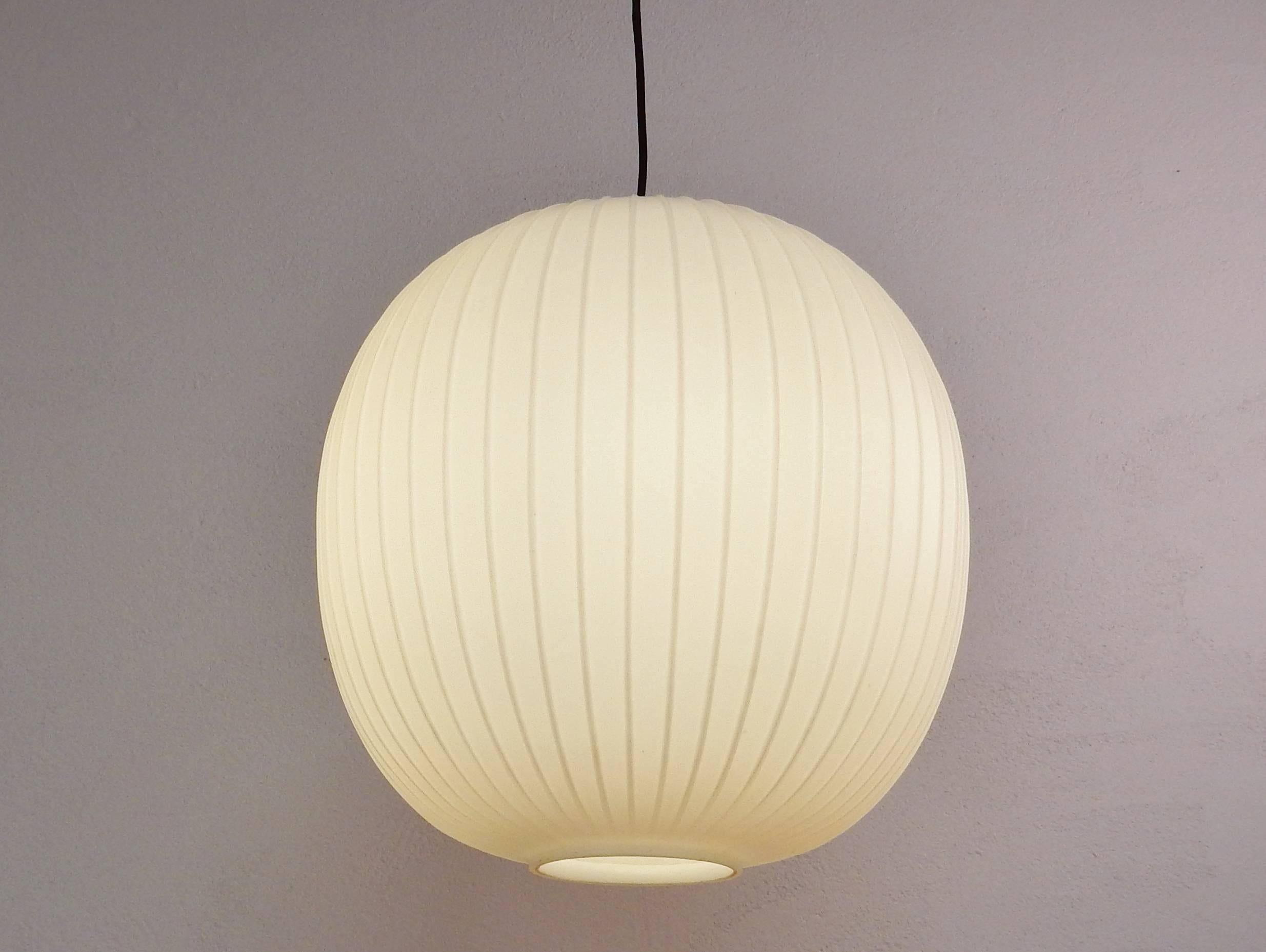 This opaline glass pendant light is in a very good condition considering age and use. Some very minor chip loss to top and bottom that maybe should not even need mentioning. This light is in original, rewired, condition and has the Peill & Putzler