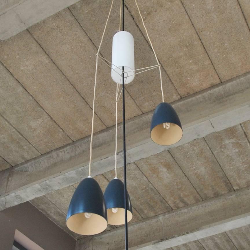 This light is a great item and a perfect resemblance of Dutch modern lighting design from the late 1950s and early 1960s.
This item comes from the home of an architect who had this custom made for his home with high ceiling. It consists out of a