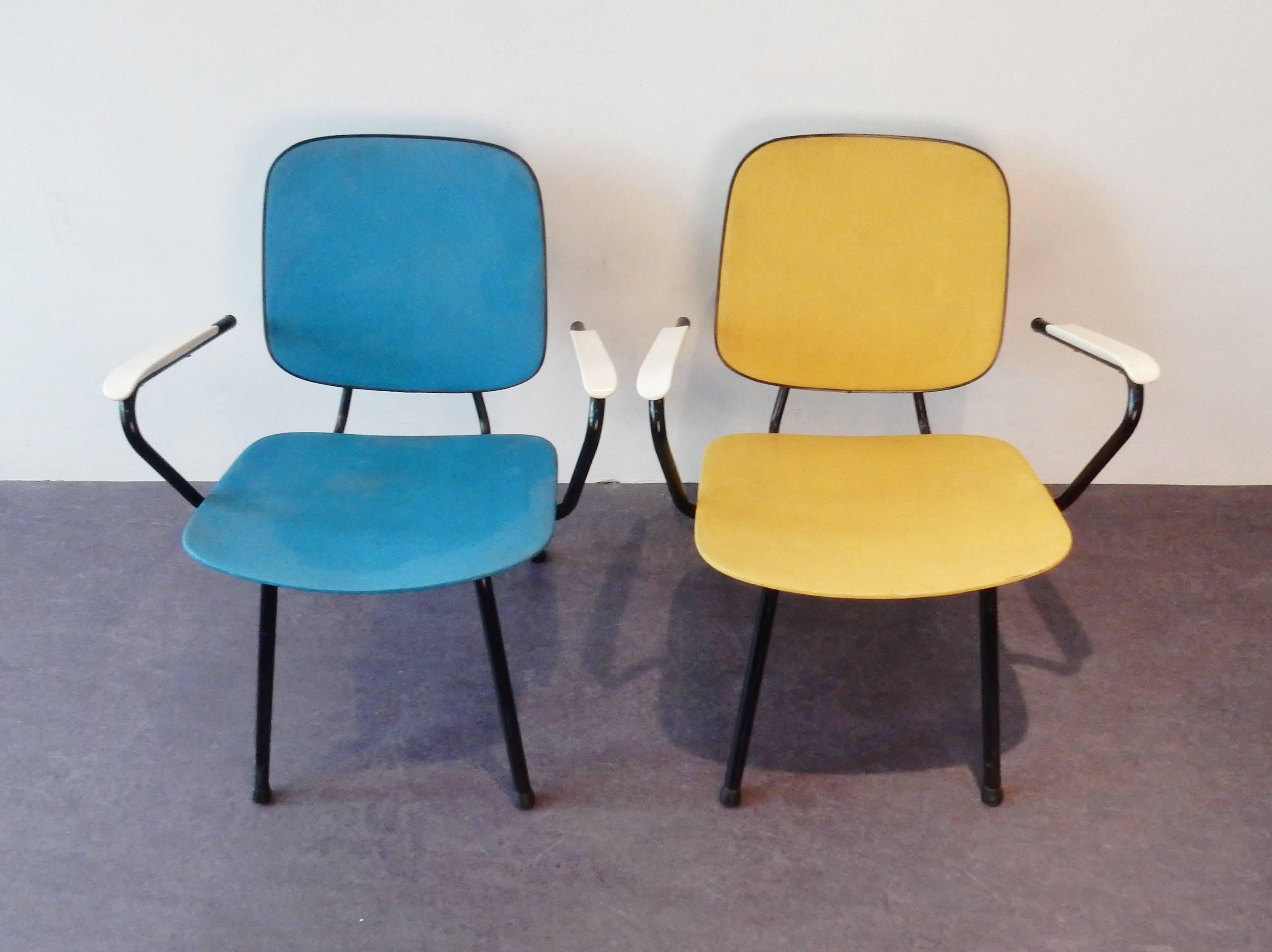 This is a set of two chairs that do not come by very often. To us the origin is unknown but the look and feel, with the sloping backrests, are similar to the 'F1' chair designs of Belgian designer Willy Van Der Meeren for Tubax or to some designs of