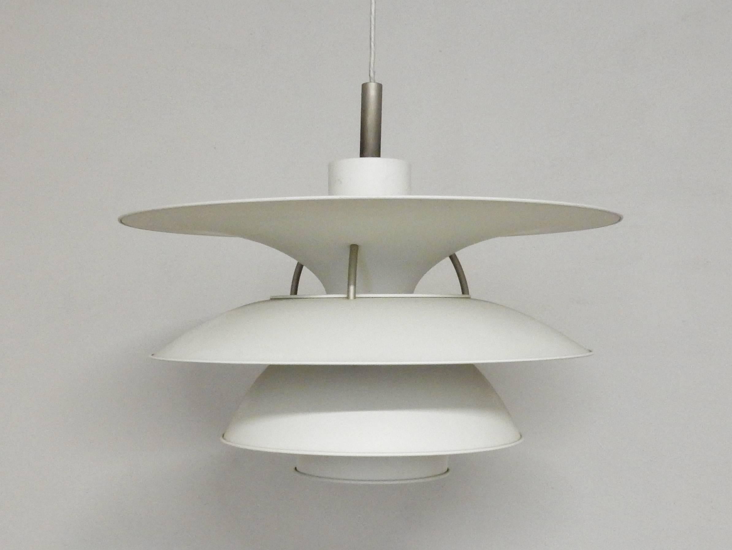 With a diameter of 65 cm this is the largest version of this PH-model.

This pendant light is a design by Poul Henningsen with Ebbe Christensen and Sophus Frandsen. With of course Poul Henningsen being the father of the PH-lights.

Measures: