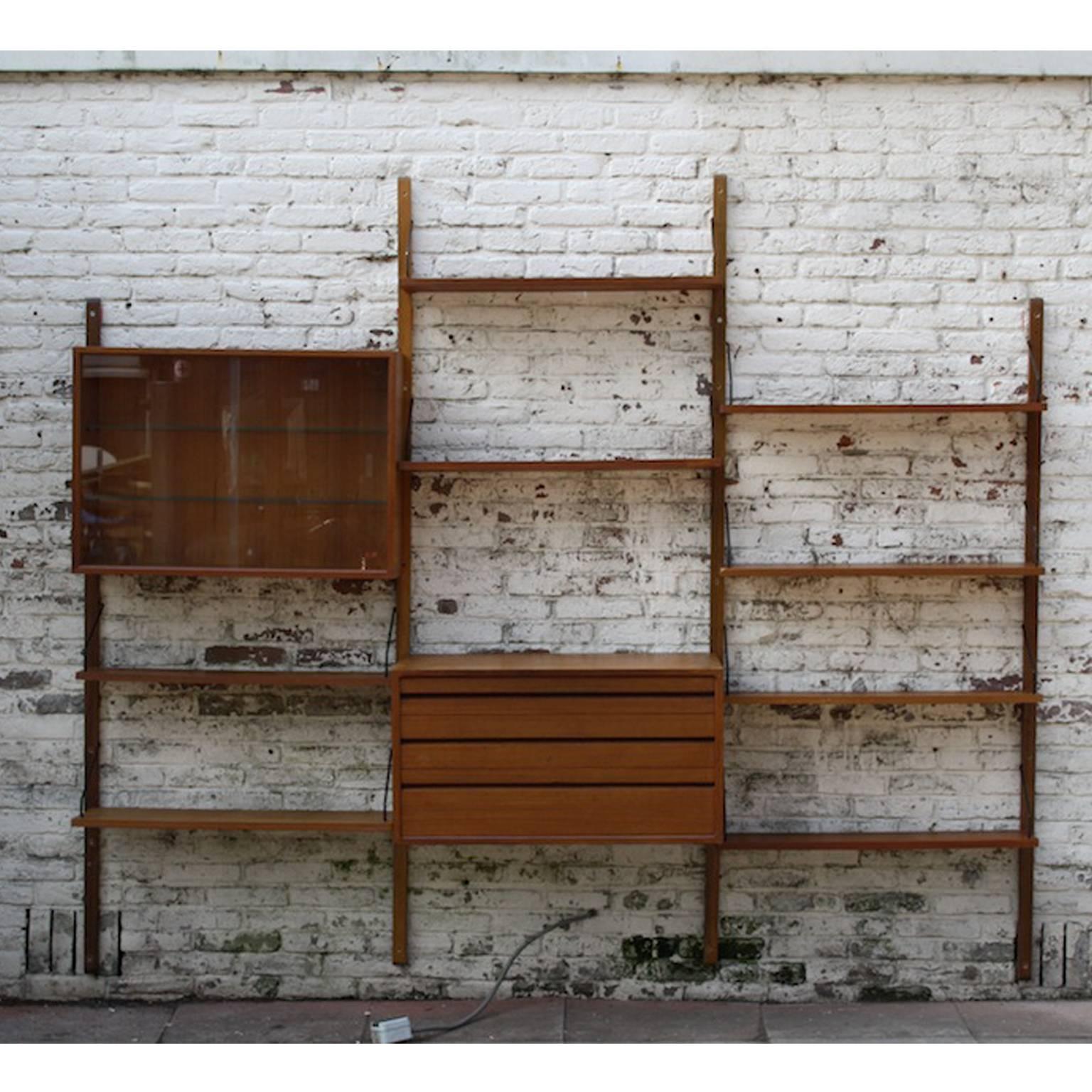 Beautiful wall system or shelving unit by the famous Poul Cadovius from Denmark.

Cadovius started his own company called 