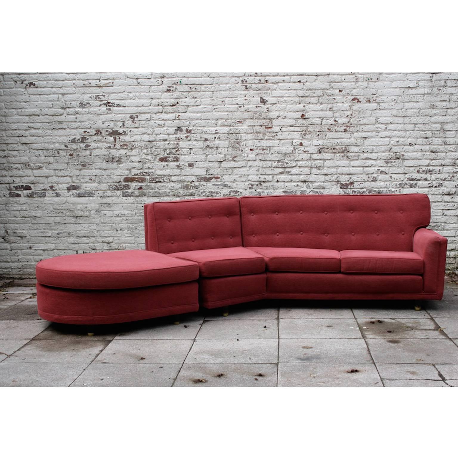 Large and stylish sofa, model K'ang, made by British furniture maker G-Plan. The original brochure speaks of a sofa inspired by Chinese designs.

The sofa has a nice angle with an extension part that could also be used a an ottoman.

Sofa is in
