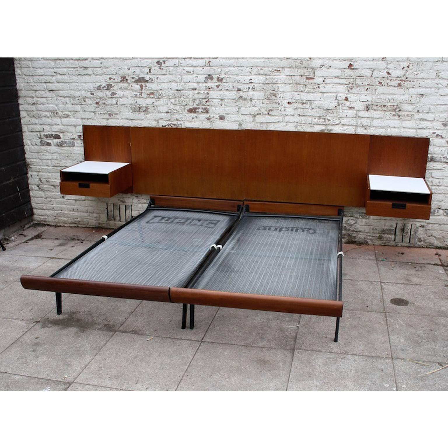 Auping Cleopatra bed and Japanese Series “LU11” headboard with “NU11” nightstand by Cees Braakman for Pastoe, Dutch design, 1950s.

Headboard from the “Japanese Series” by Cees Braakman for UMS Pastoe with two identical nightstands. The headboard