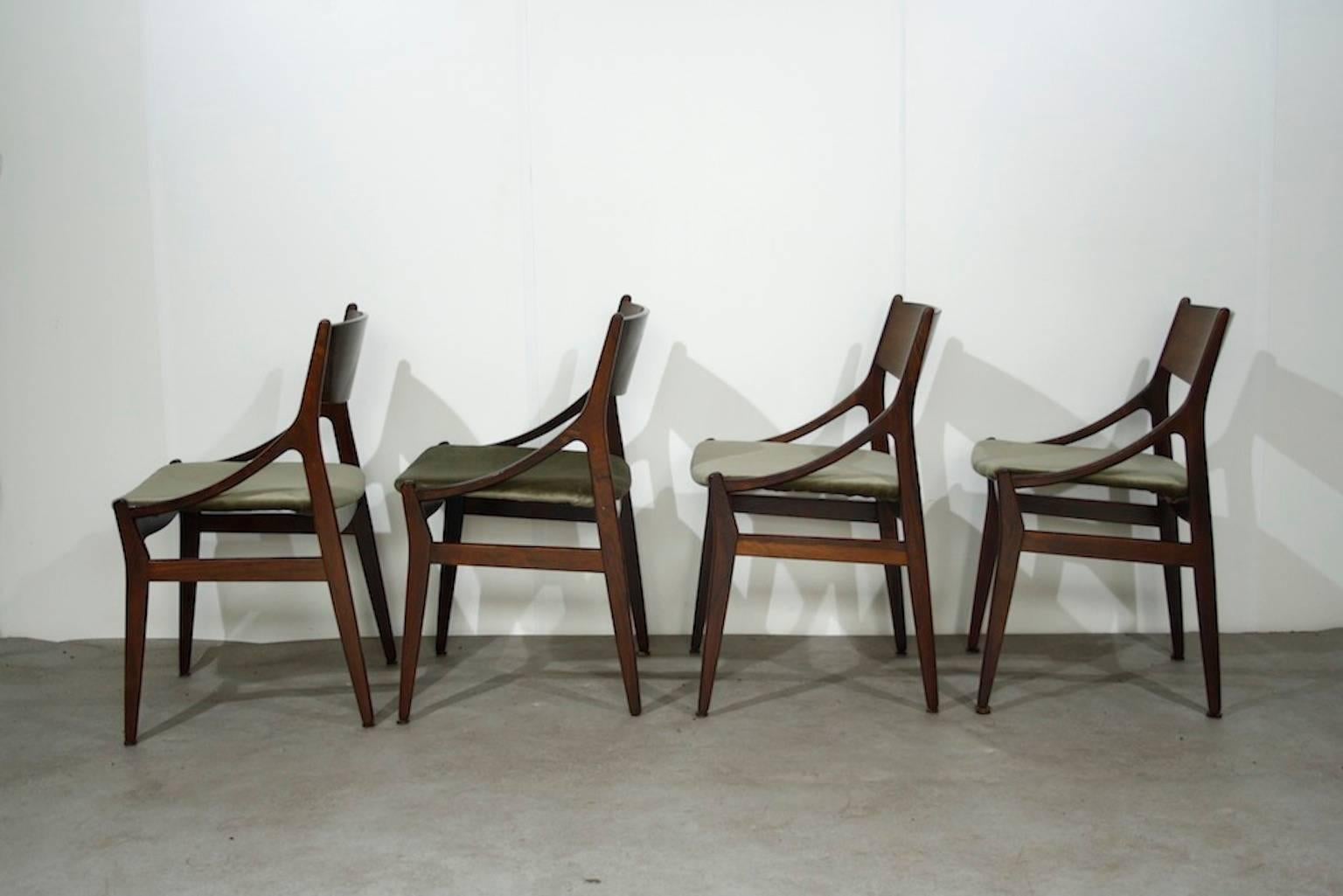Four rosewood dining chairs, with new green-grey velvet upholstery.