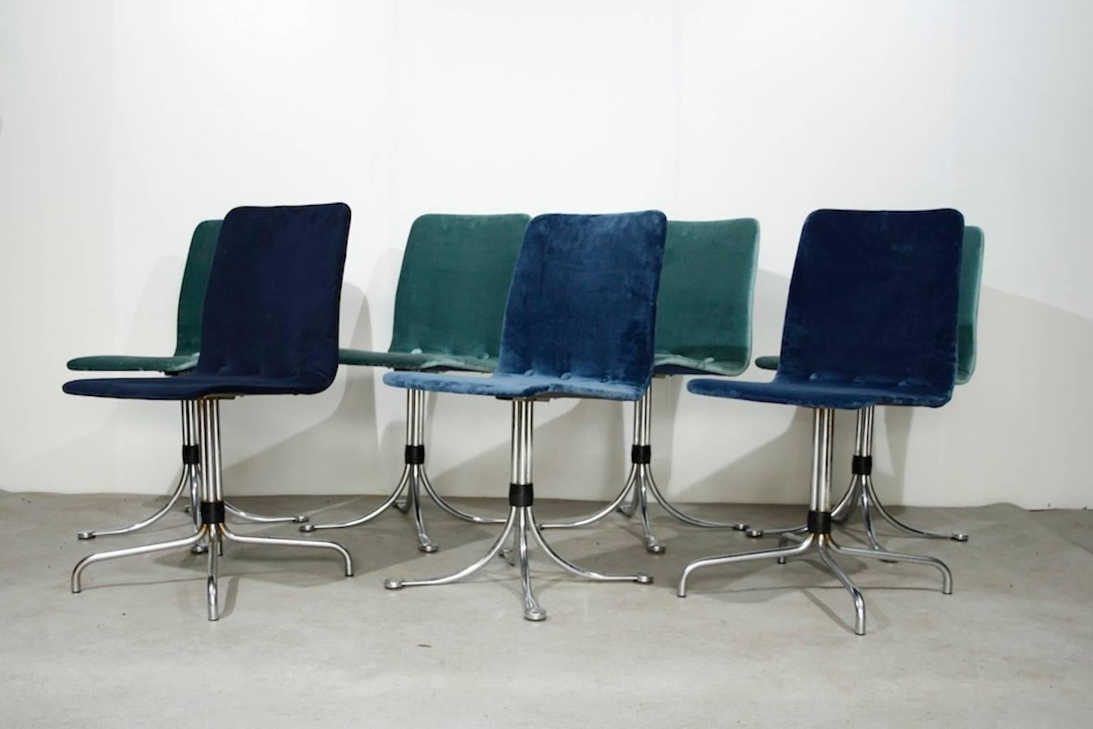 Four with new mint green velvet upholstery. And three with dark blue velvet upholstery, but with two different metal feet.
The green and blue can be sold separately.

Height: 84 cm ; seating: 47 cm
Width: 43 cm
Depth: 46 cm; seating 36 cm