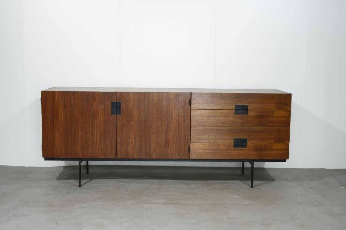 Cees Braakman DU04 Japanese series for Pastoe credenza or sideboard, The Netherlands, 1950s

This beautiful sideboard is over 50 years old, but still looks fantastic and very modern with its elegant black metal legs and minimal door handles. Its