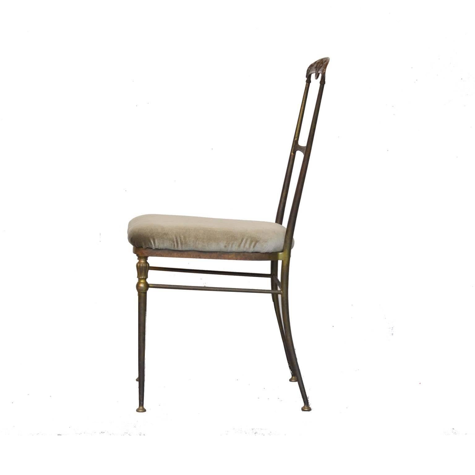 Bronze dining chair with beautiful details in the back. New green velvet upholstery.