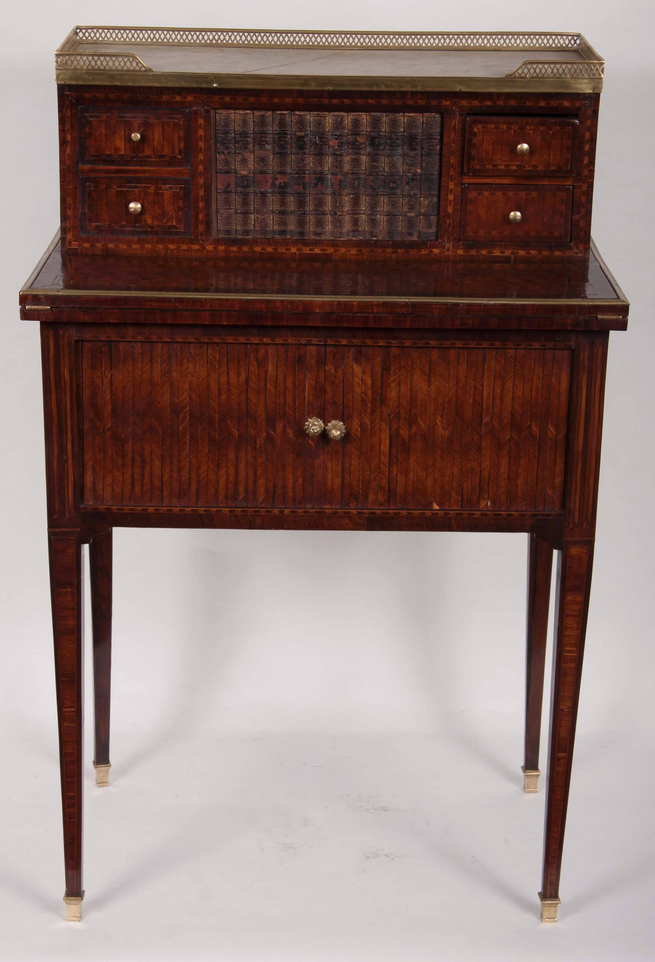 French Louis XVI writing desk with white marble top. Gilt bronze-mounted top panel has four pull-out drawers, foldable side panels and bottom compartment has three additional drawers.