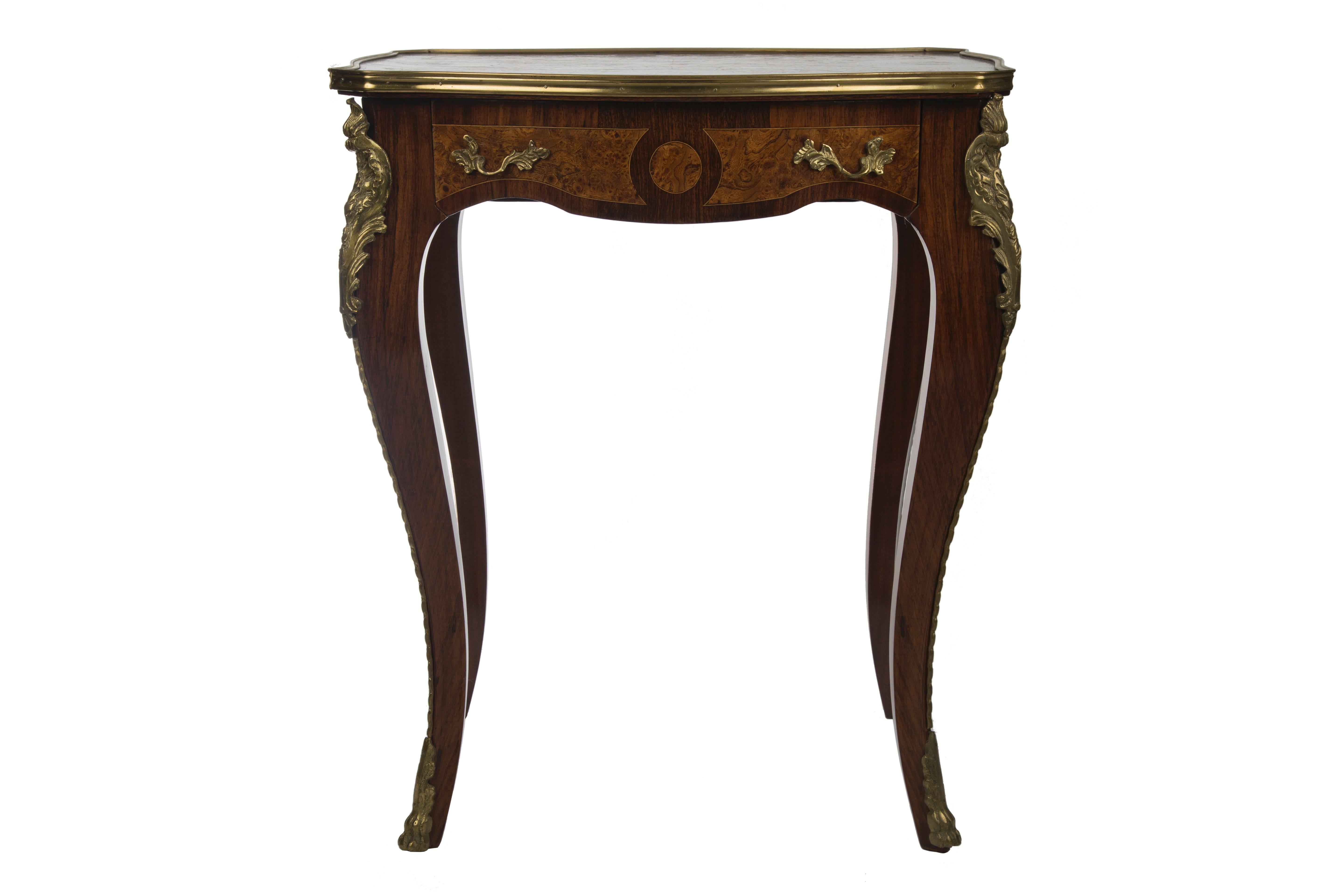 Pair of gilt bronze-mounted veneered fruitwood marquetry inlay tables with single drawer. France, 19th century.
 