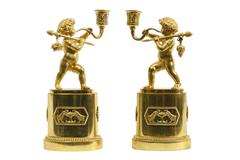 Pair of French Gilt Bronze Figural Candlesticks
