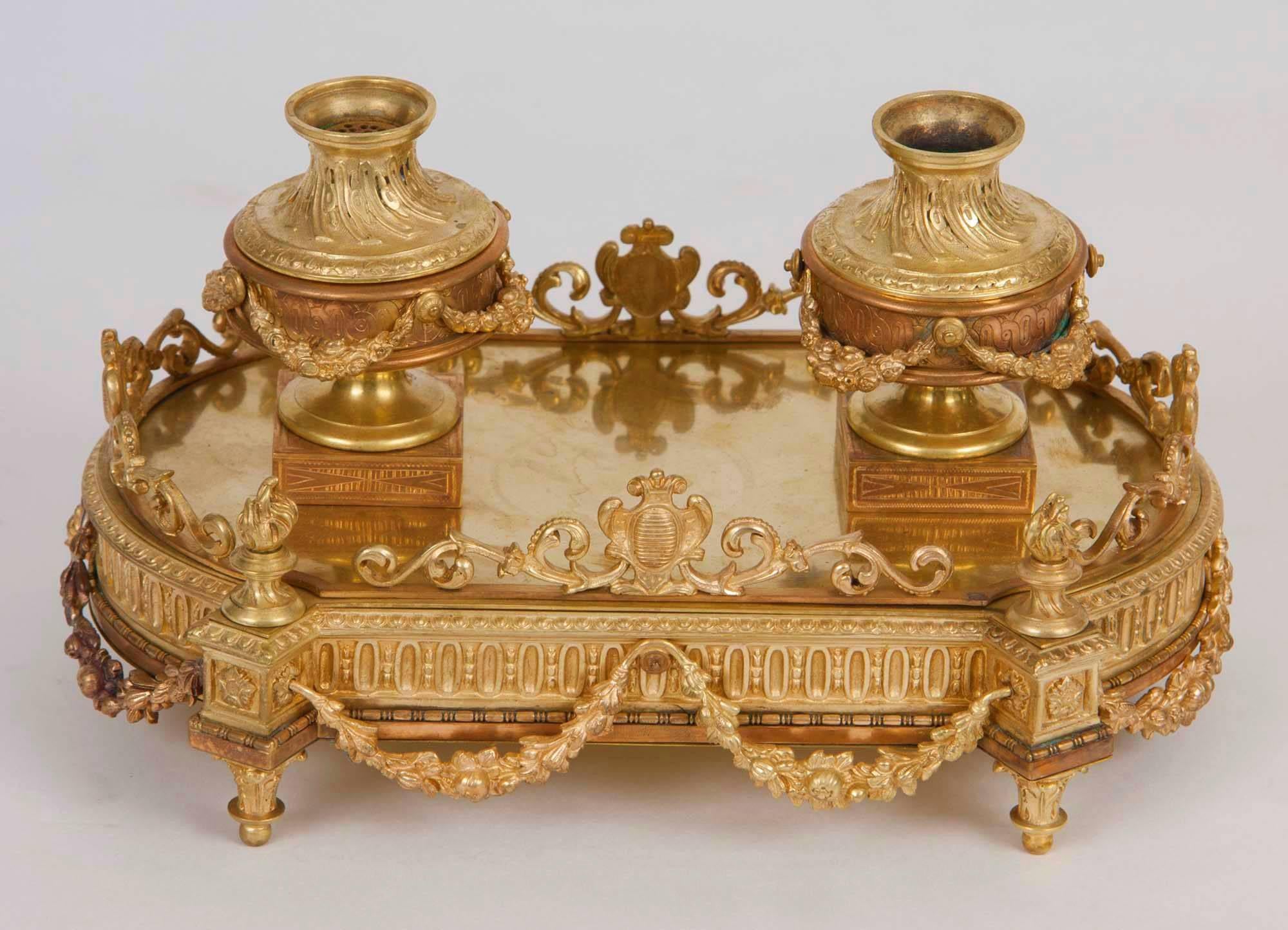 French Louis XVI ornate gilt bronze inkwell with hidden storage compartment.