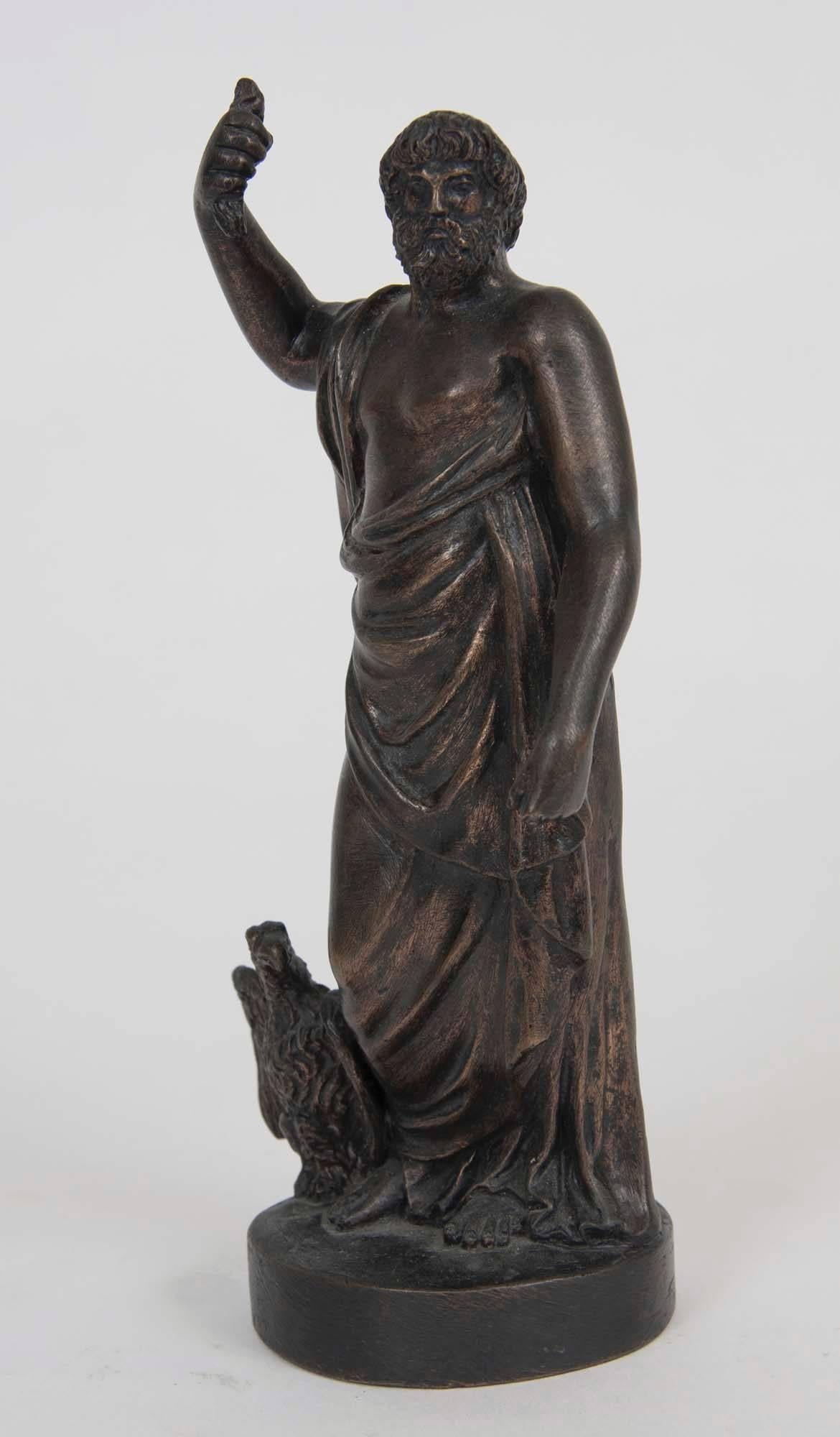 Bronze figure of Zeus attended by eagle, his symbolic form.