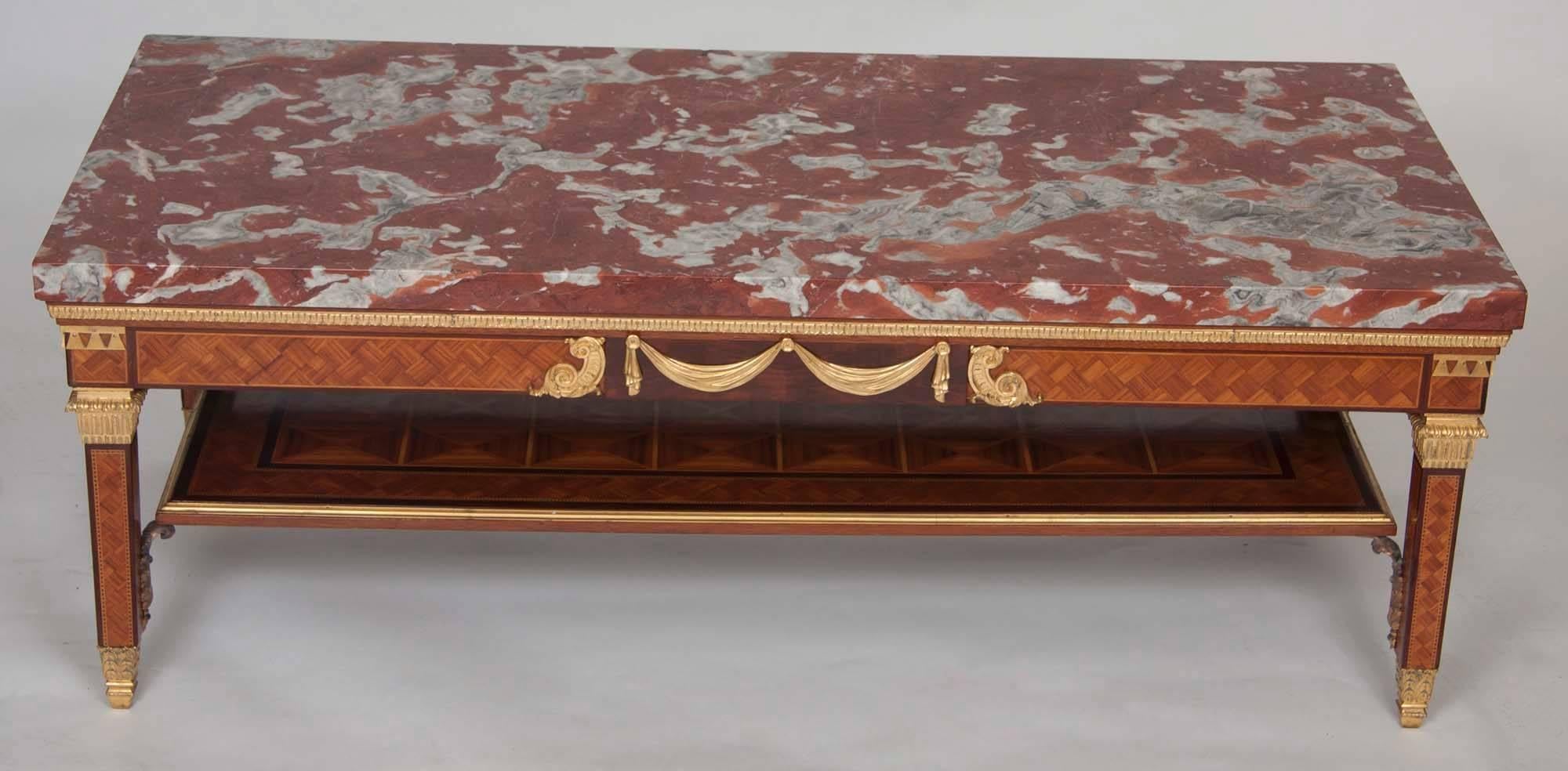 American, 19th century.
Marquetry coffee table with marble top.
Provenance: Estate of Caldwell, New Jersey.