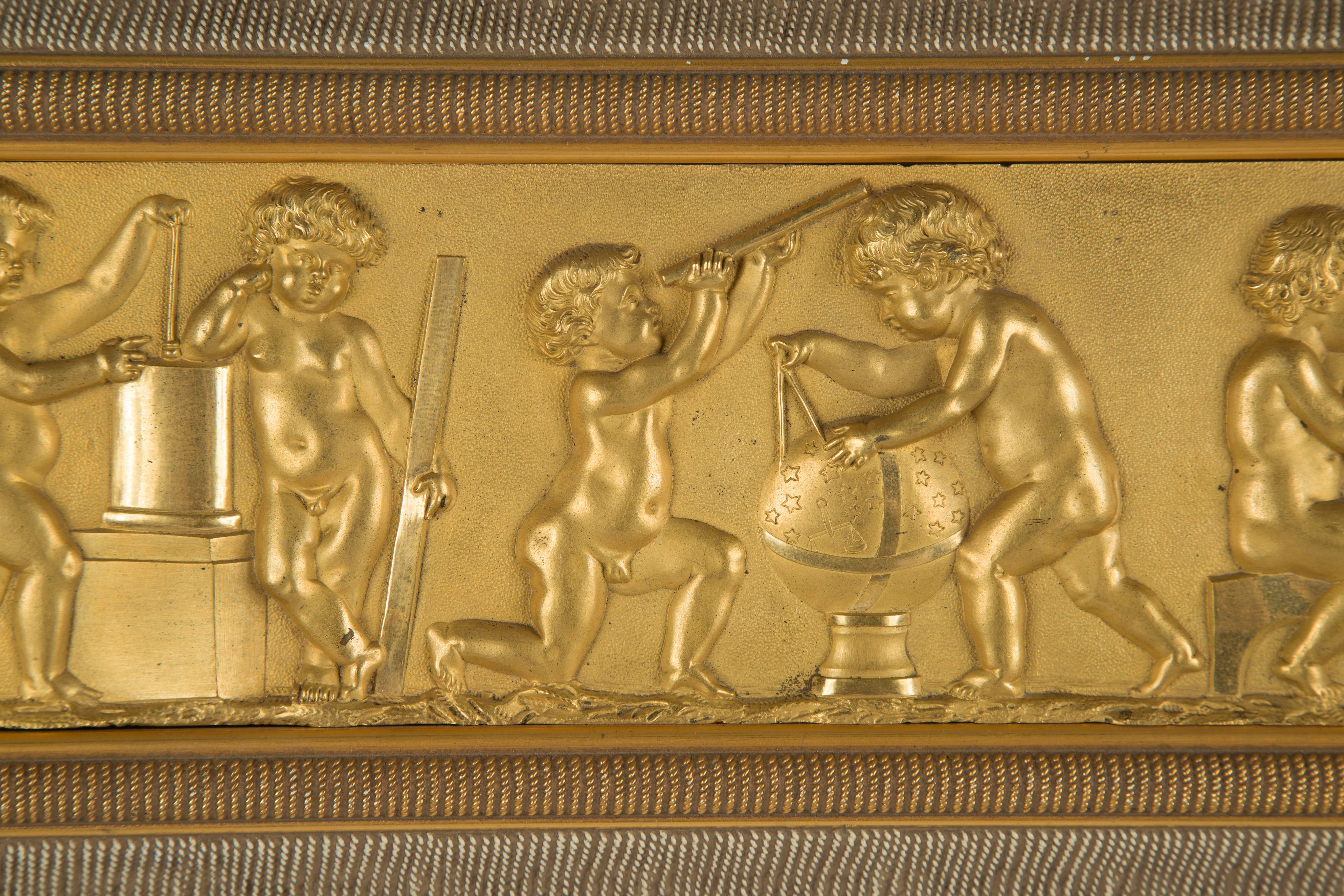 Mercury bronze narrative relief with putti figures in different scenes.