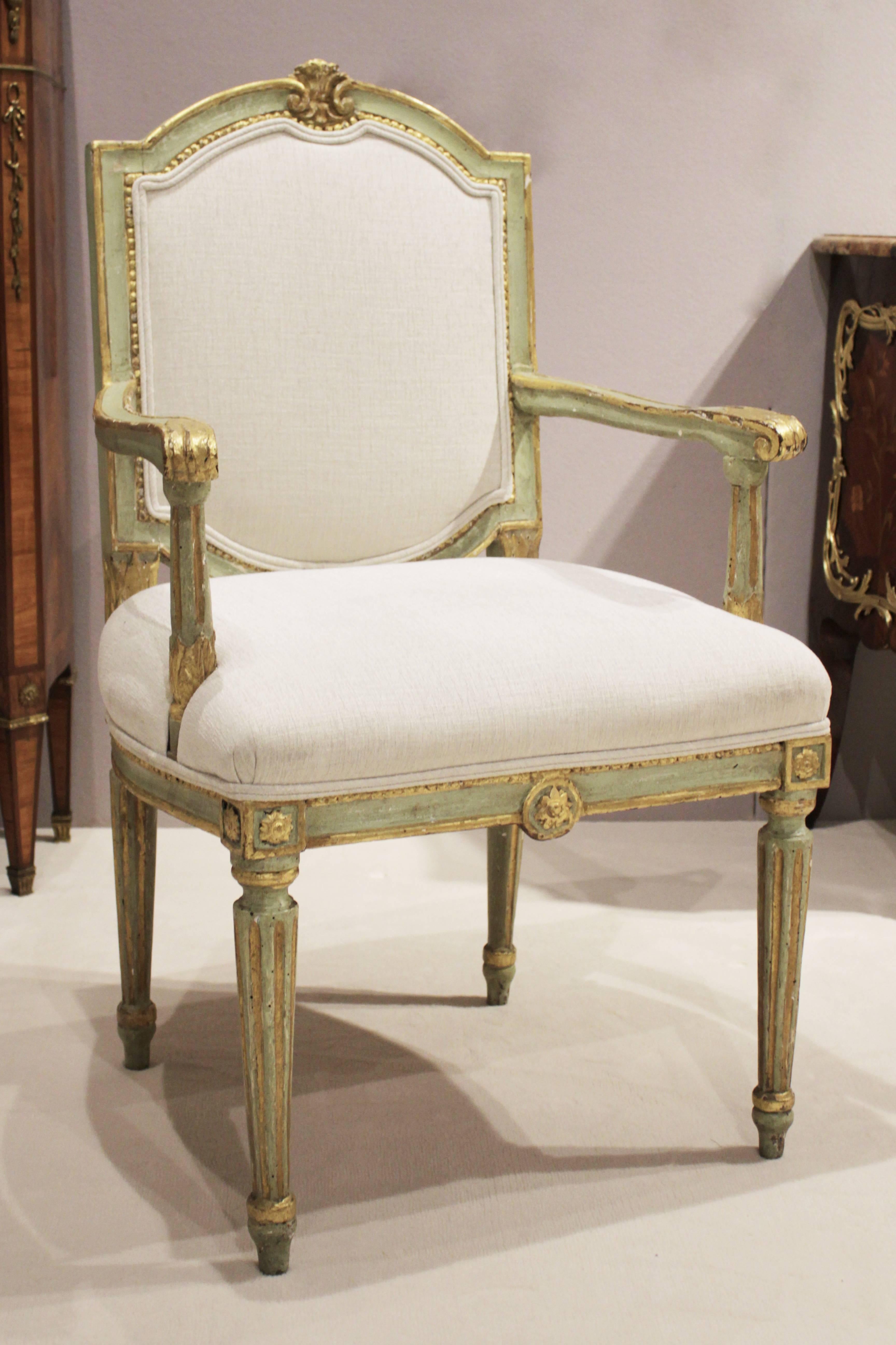 Pair of Venetian lacquer povera armchairs
green-painted and parcel-gilt
Italy, 18th century
Measures: H 39in. x W 22in. x D 17in.