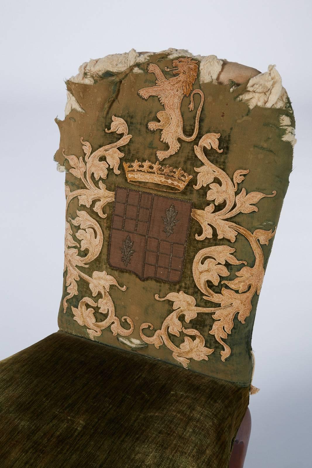 This is a Queen Anne walnut side chair with original goldwork upholstery,
circa 1725.