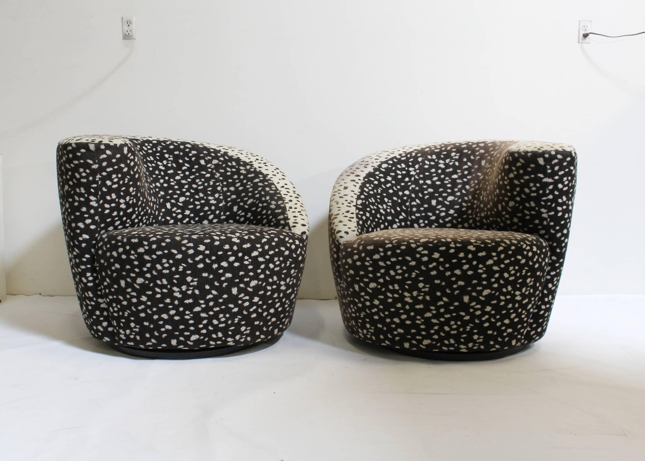 Matching set of Nautilus chairs designed by Vladimir Kagan and manufactured by Directional Furniture. Amazing, original, spotted two-tone upholstery from the 1980s. Upholstery is stained and faded and may need to be replaced (see pictures.)

In