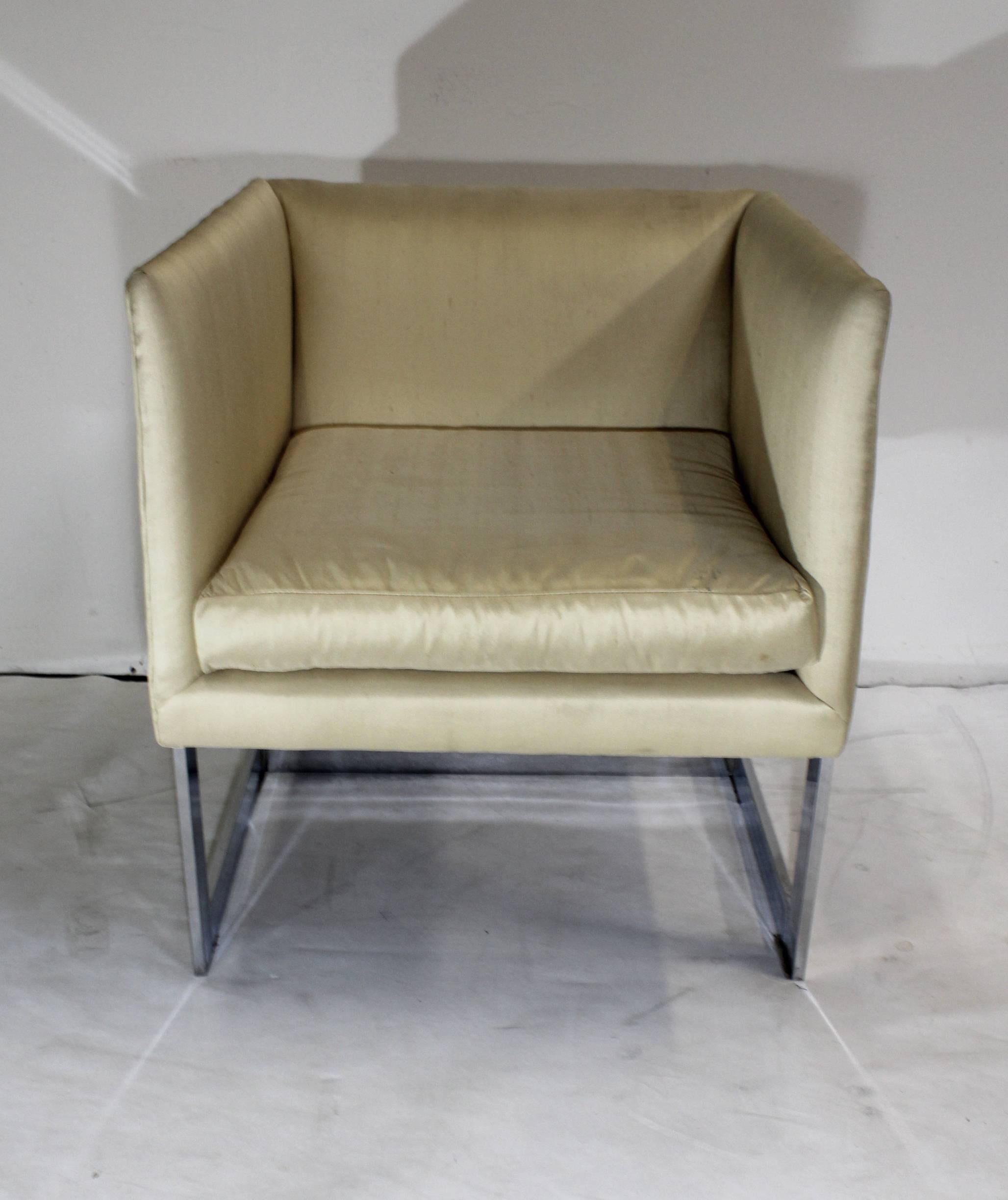 Small cube chrome and silken material chair, attributed to Milo Baughman (unfortunately is unlabeled). Has light staining on fabric (pictured).