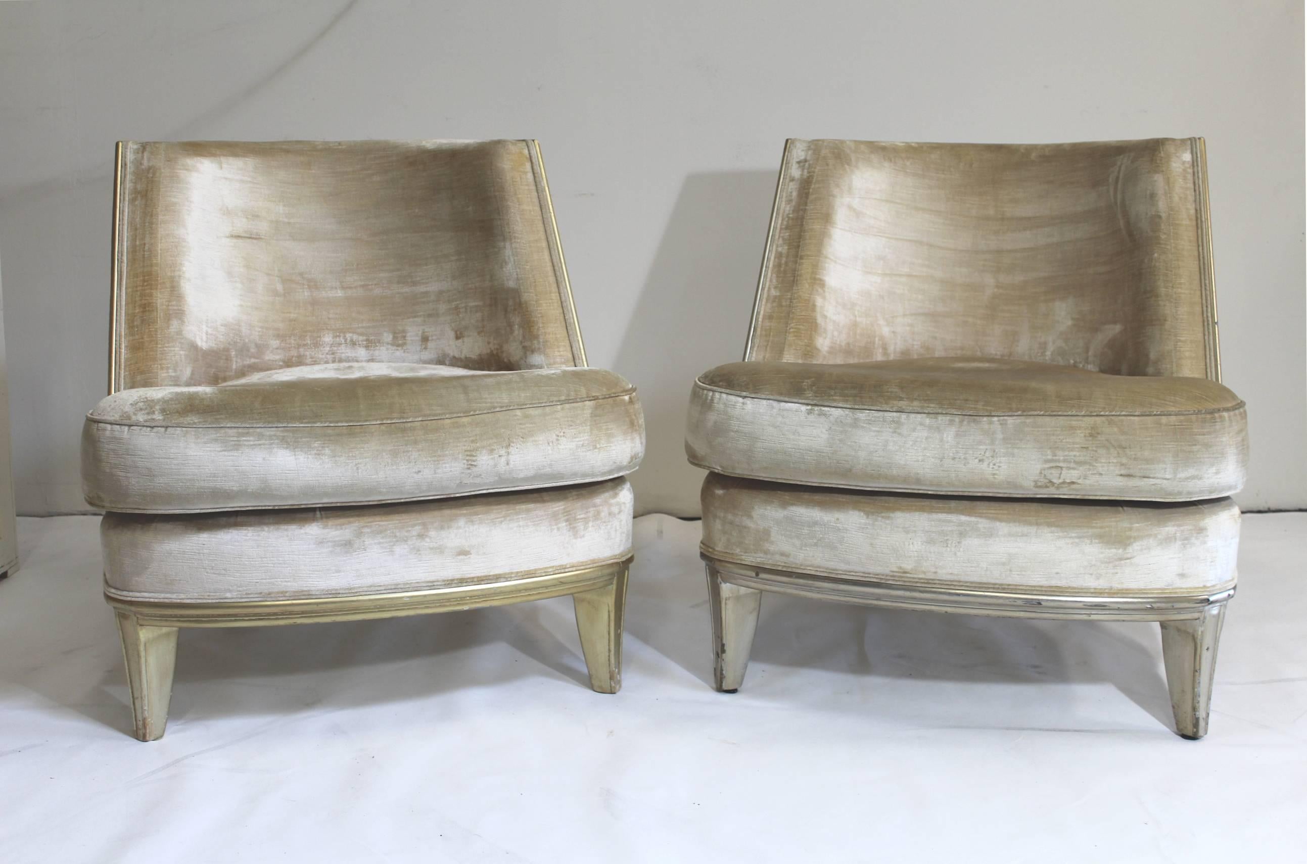 Stunning pair of barrel-back antique chairs, reupholstered in soft and comfortable grey/gold/crème velvety fabric. Raised on gilt bracket feet.