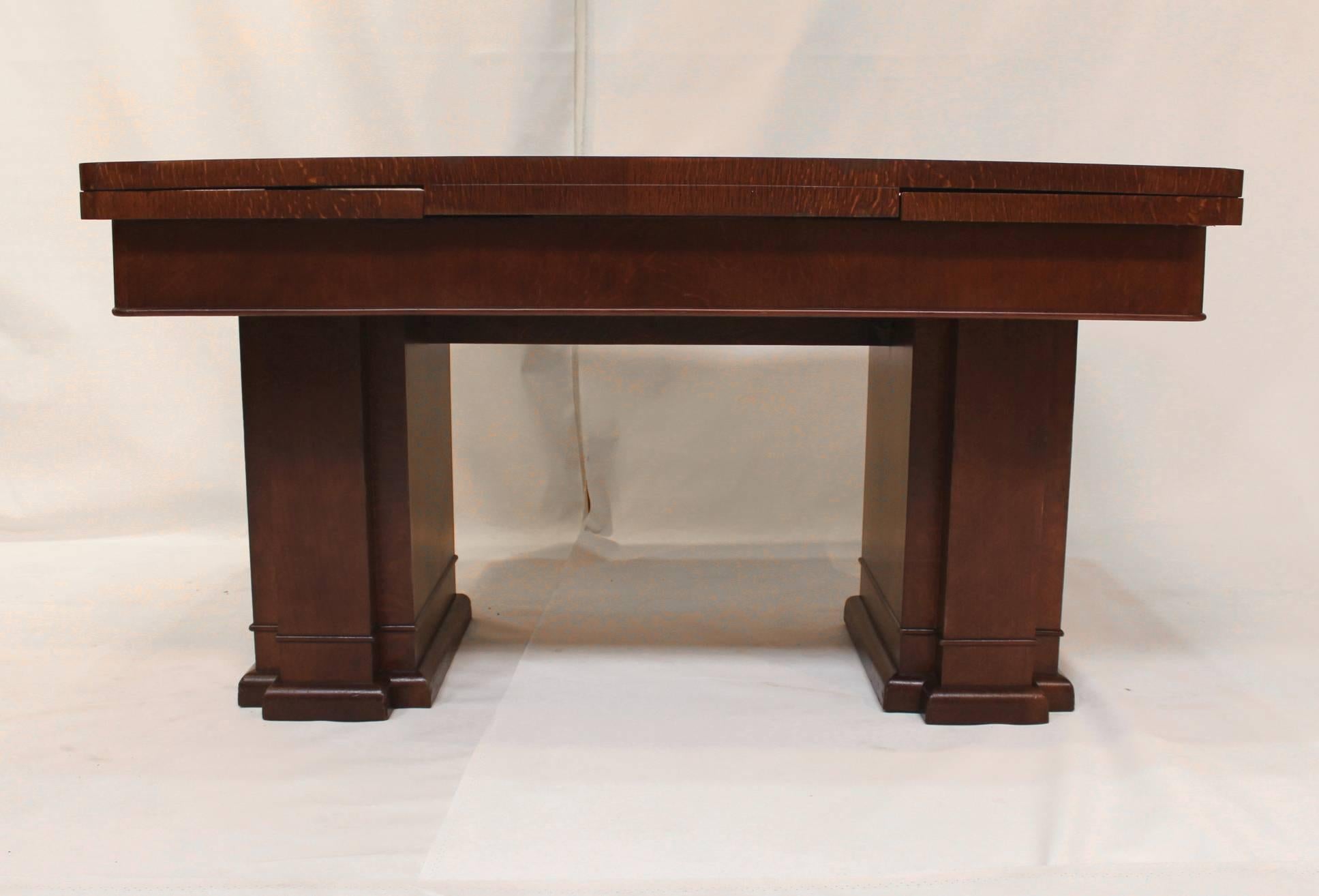 1930s early Art Deco architectural table. Quarter-sawn, tiger's-eye oak with amazing golden striping. Would make a spectacular desk as well.

Extends to 84