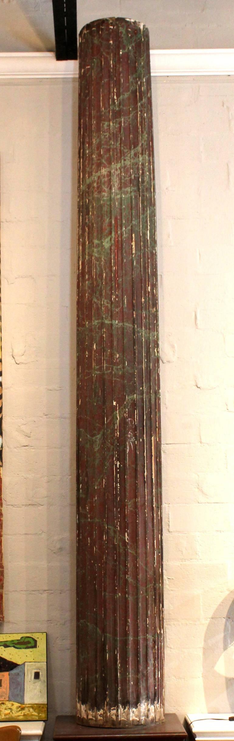 Italian wood columns from the early 1800's with a beautiful time-worn hand-painted faux marble finish. The columns have half narrow half wide channels (see pictures). Columns only, no base or capital.