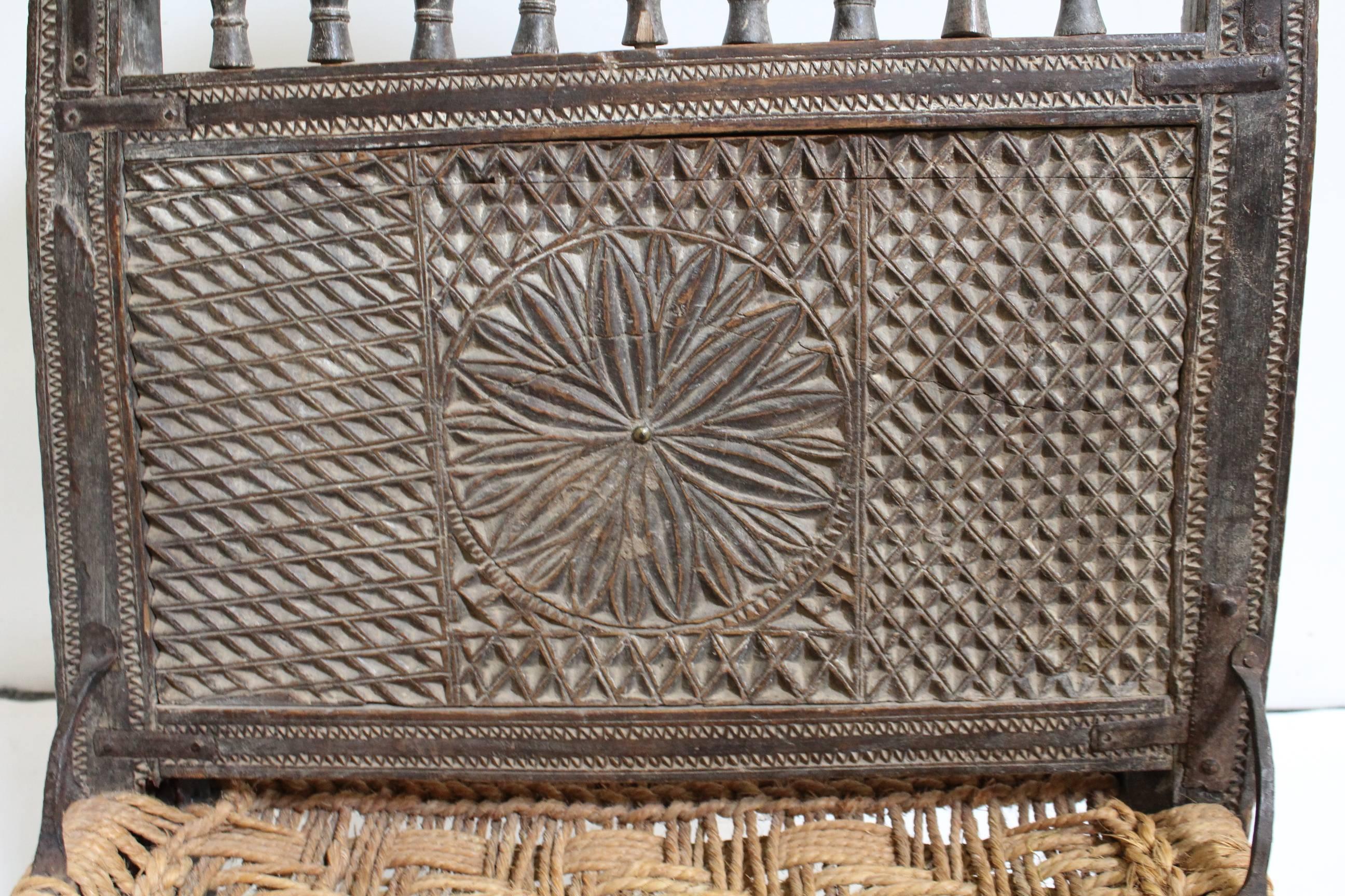 Antique Afghan Chieftain Ceremonial Hand-Carved Chair with Woven Rope Seat In Good Condition In Dallas, TX