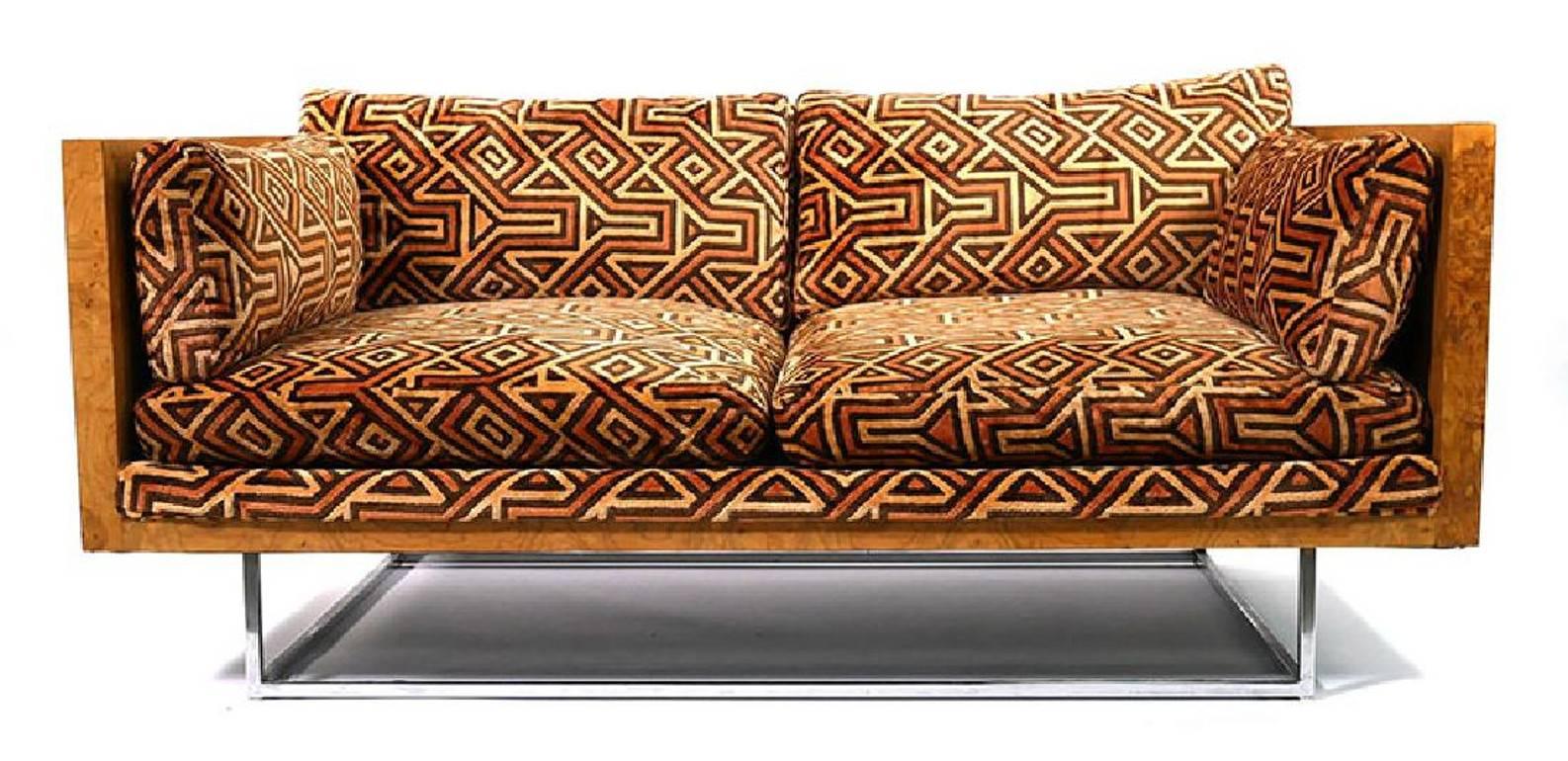 Stunning Milo Baughman for Thayer Coggin sofa with wraparound burl wood and chrome legs. Comes with original Jack Lenor Larsen upholstery with cool African inspired print from the 1970s.